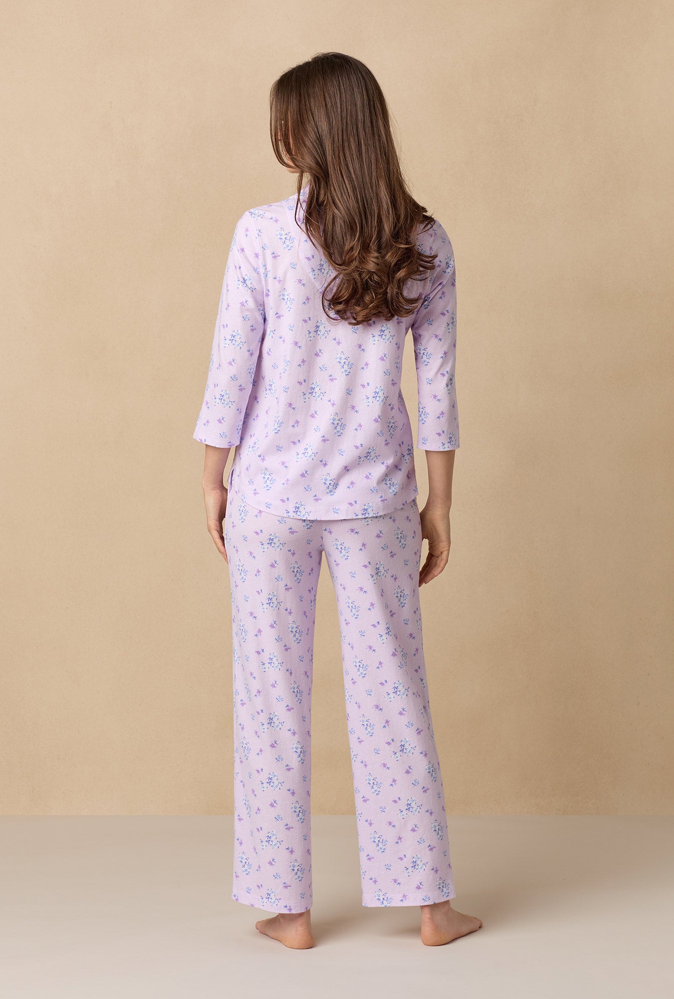 A lady wearing Mini Floral Cotton Long Pajama Set