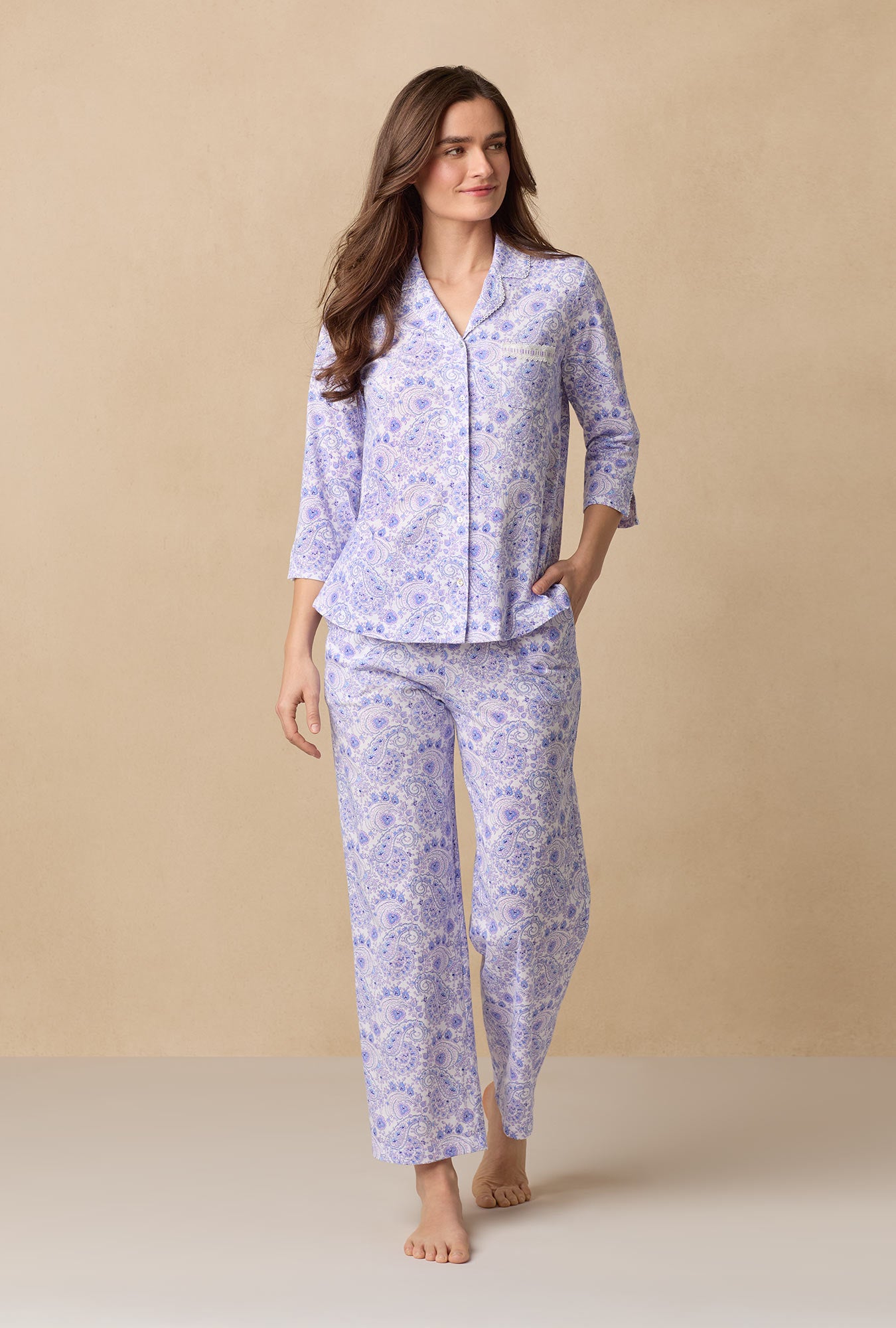A lady wearing Purple Paisley Cotton Long Pajama Set