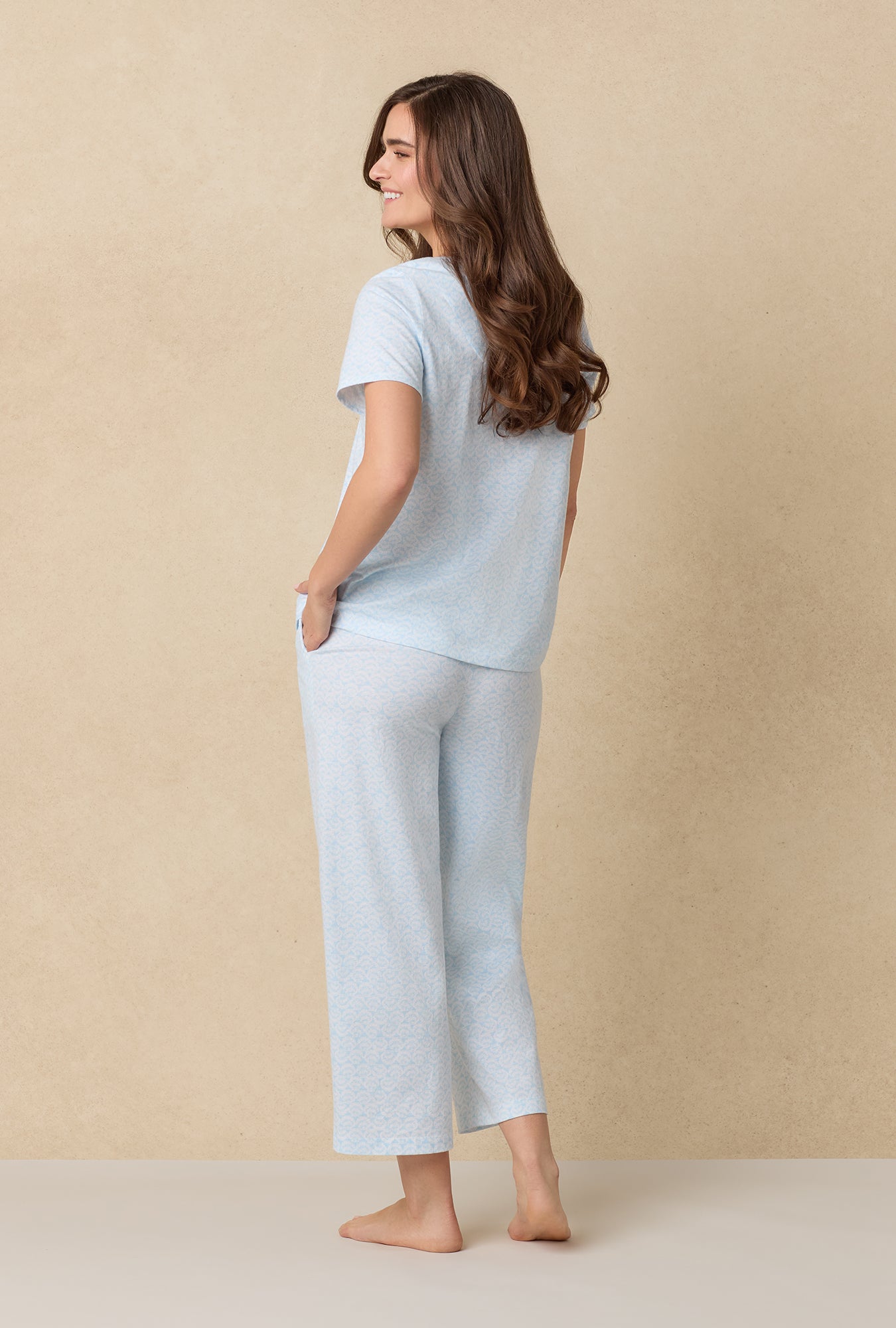 A lady wearing Blue Shells Cotton Capri Pajama Set