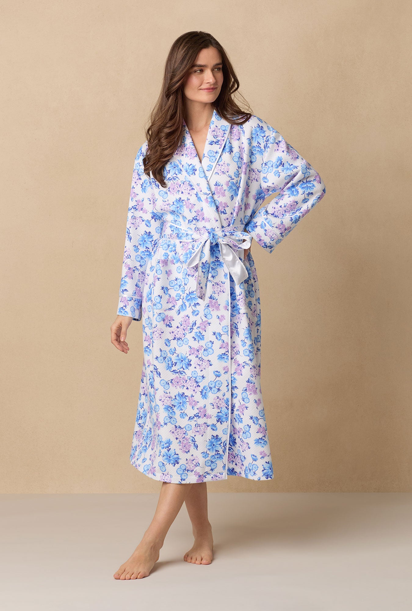 A lady wearing Purple Hydrangea
long sleeve diamond quilted wrap robe.