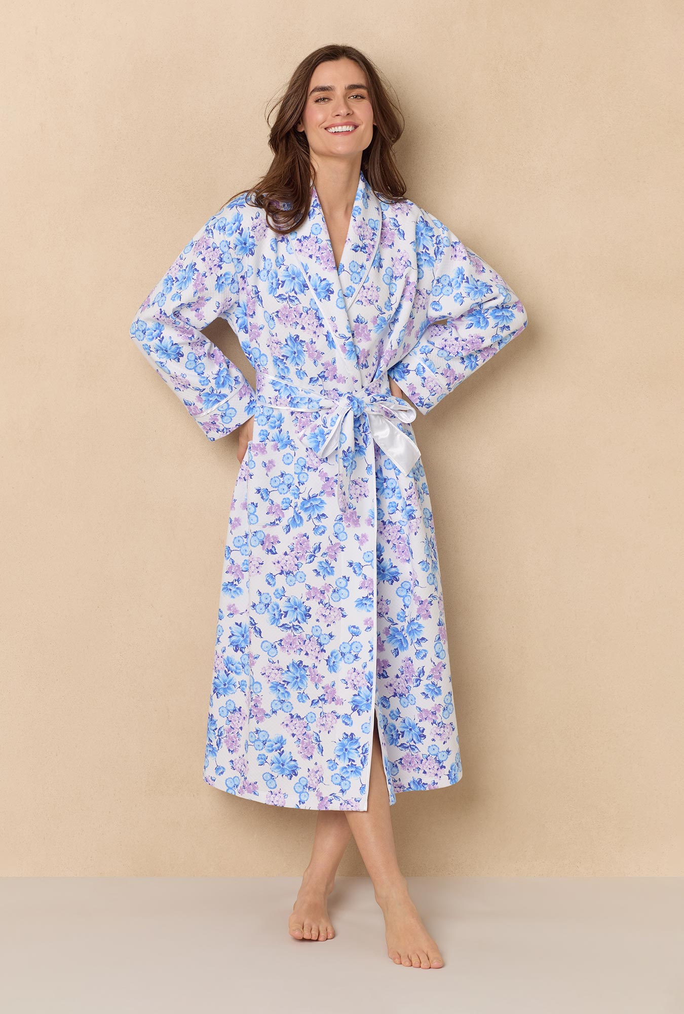 A lady wearing Purple Hydrangea
long sleeve diamond quilted wrap robe.