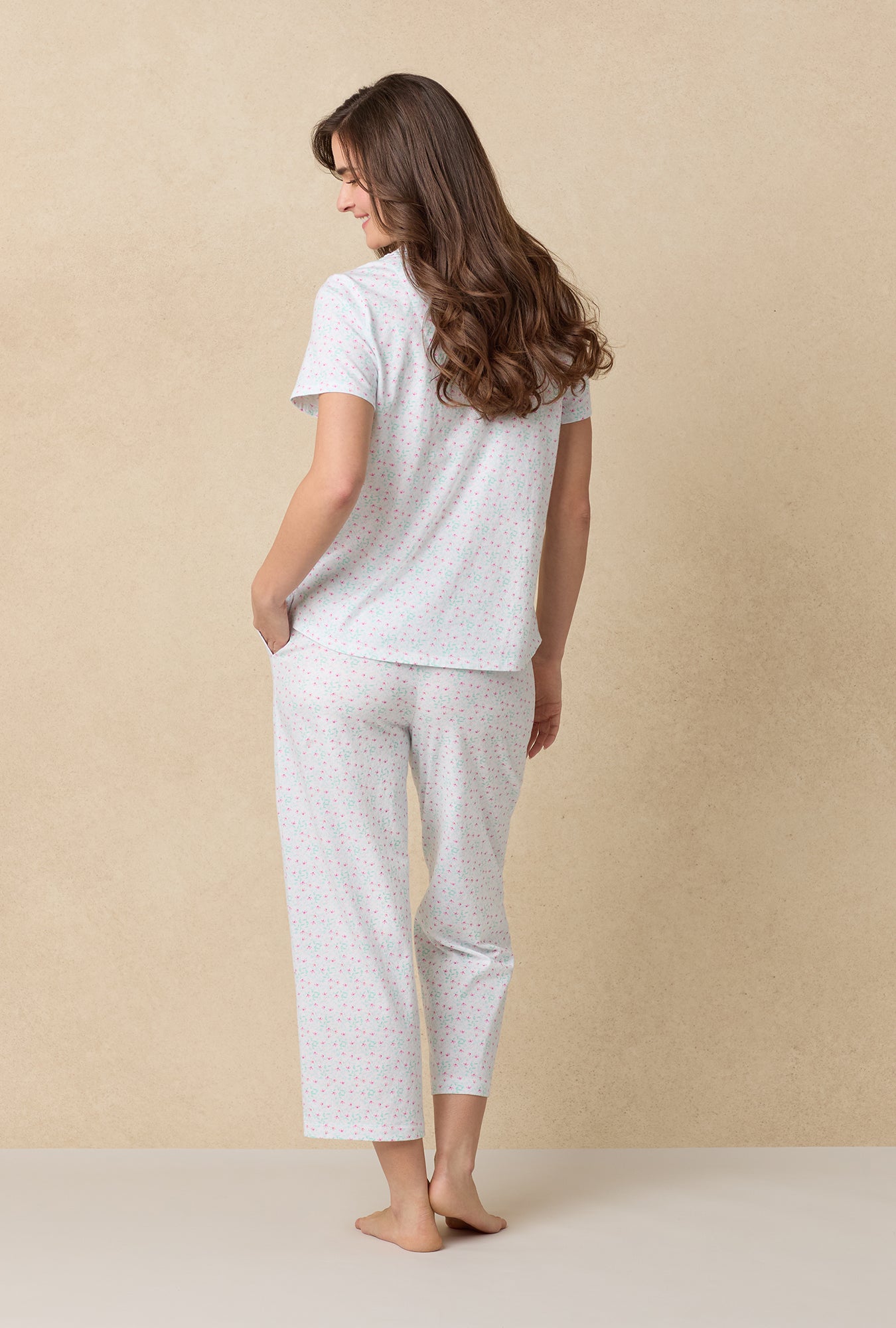 A lady wearing Viney Floral Cotton Capri Pajama Set