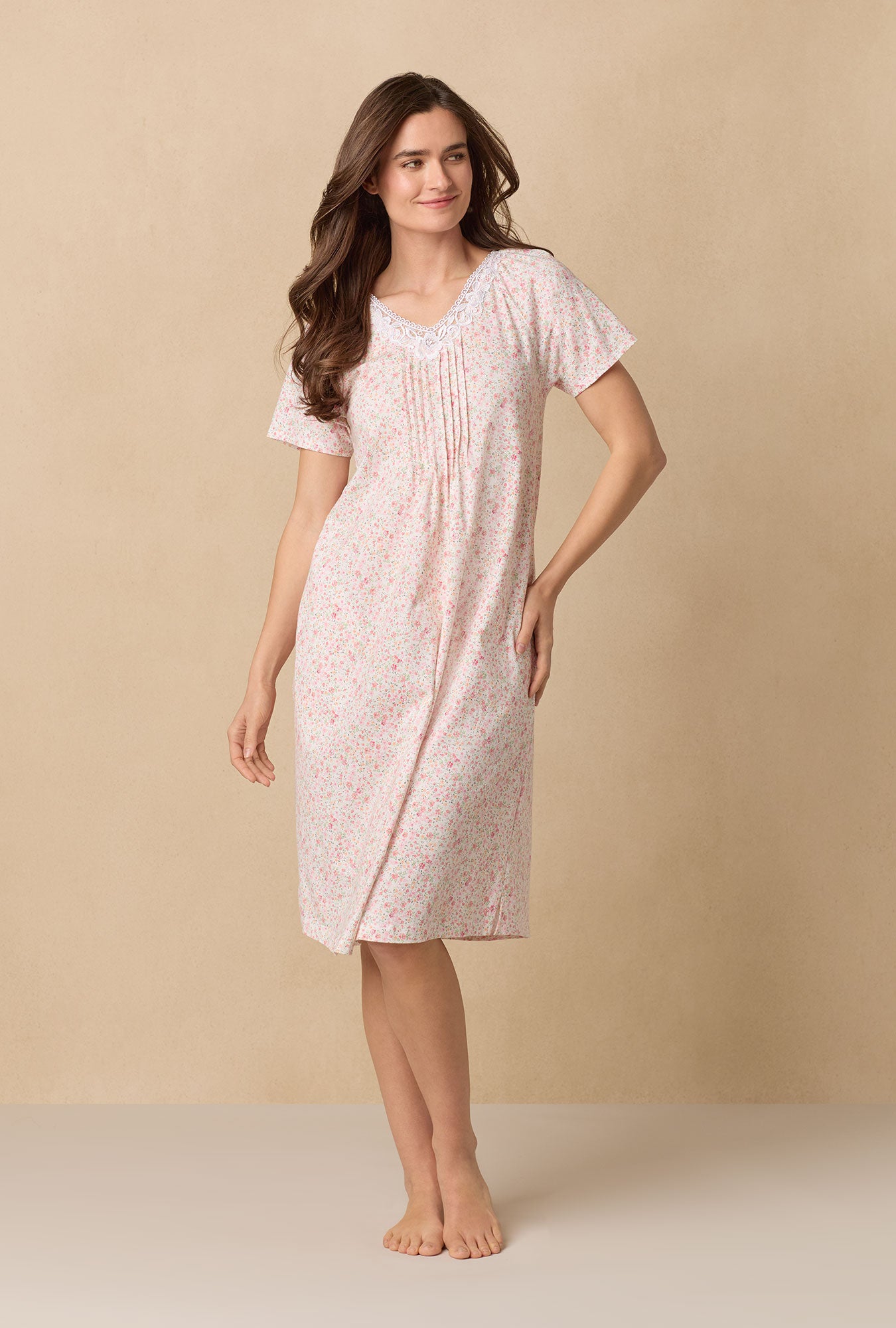 A lady wearing Meadow Floral Waltz Cotton Knit Nightgown
