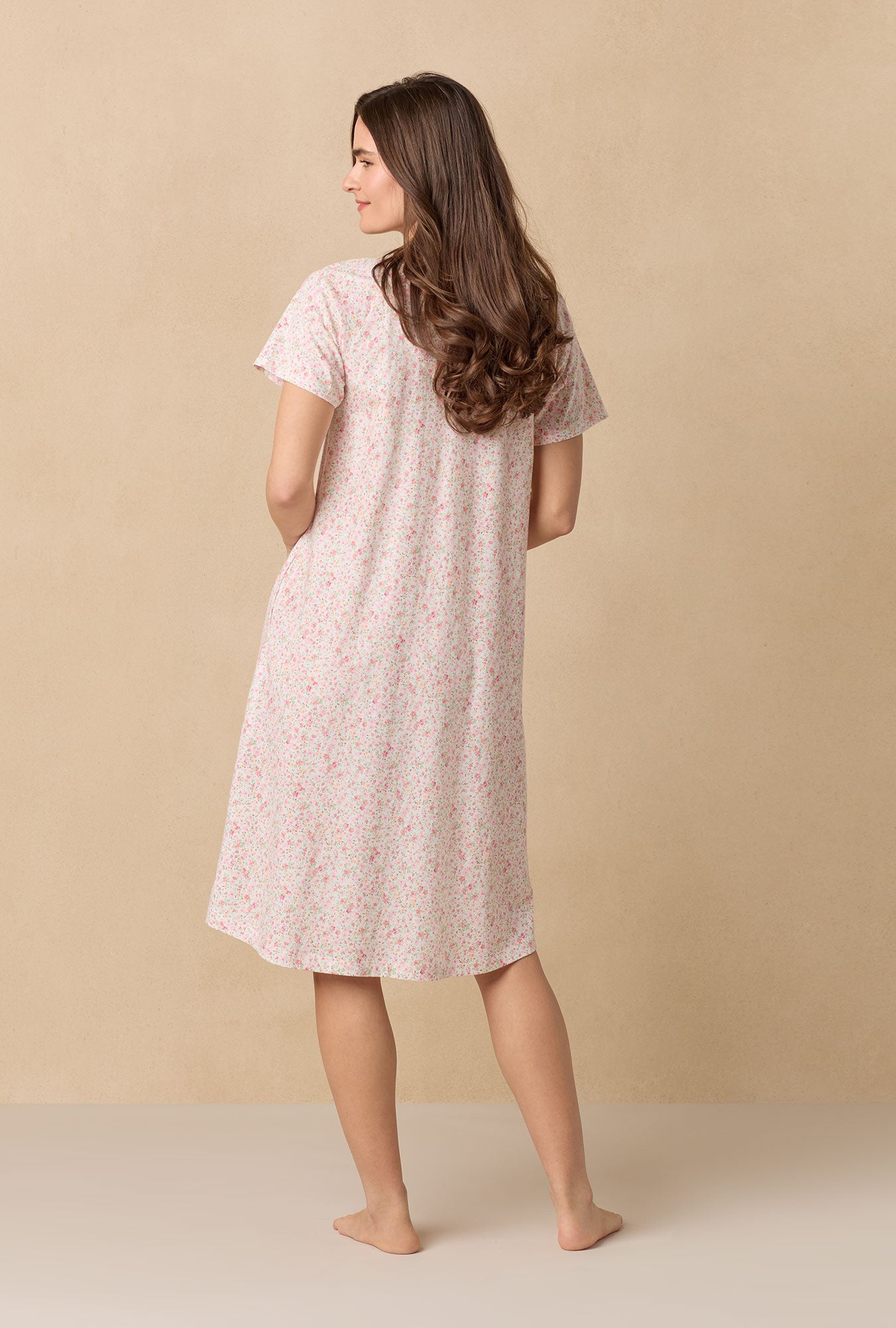 A lady wearing Meadow Floral Waltz Cotton Knit Nightgown
