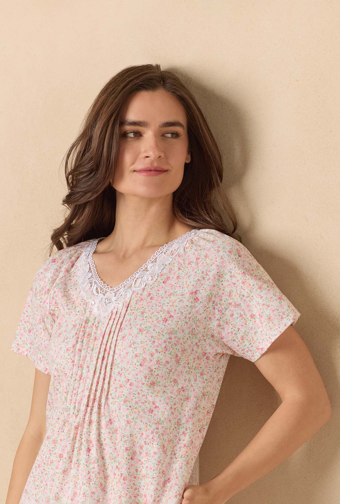 A lady wearing Meadow Floral Waltz Cotton Knit Nightgown