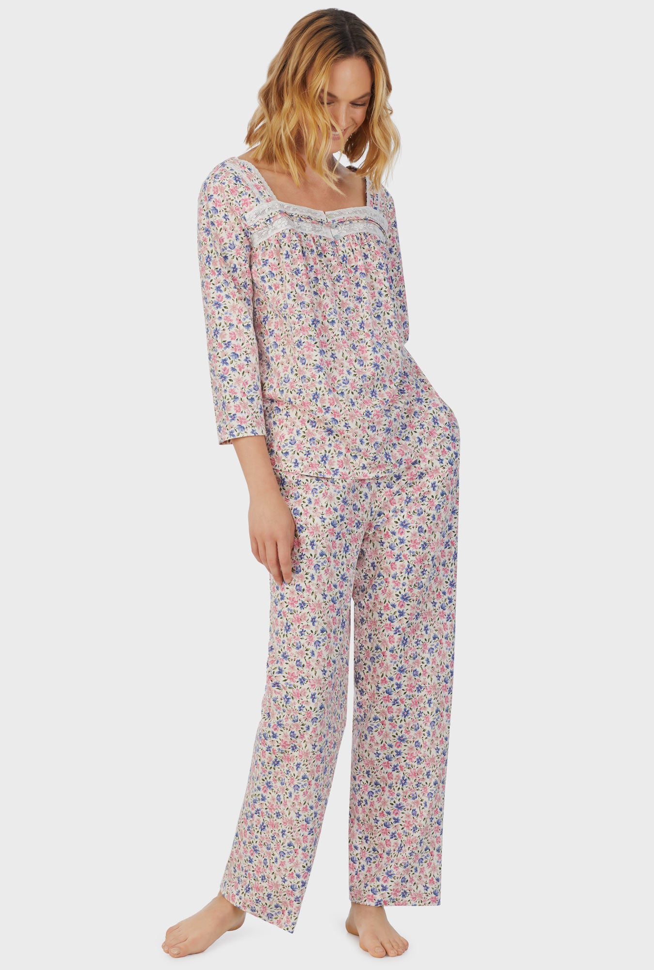 A lady wearing pink short sleeve Long Pajama Set with Floral Fields print