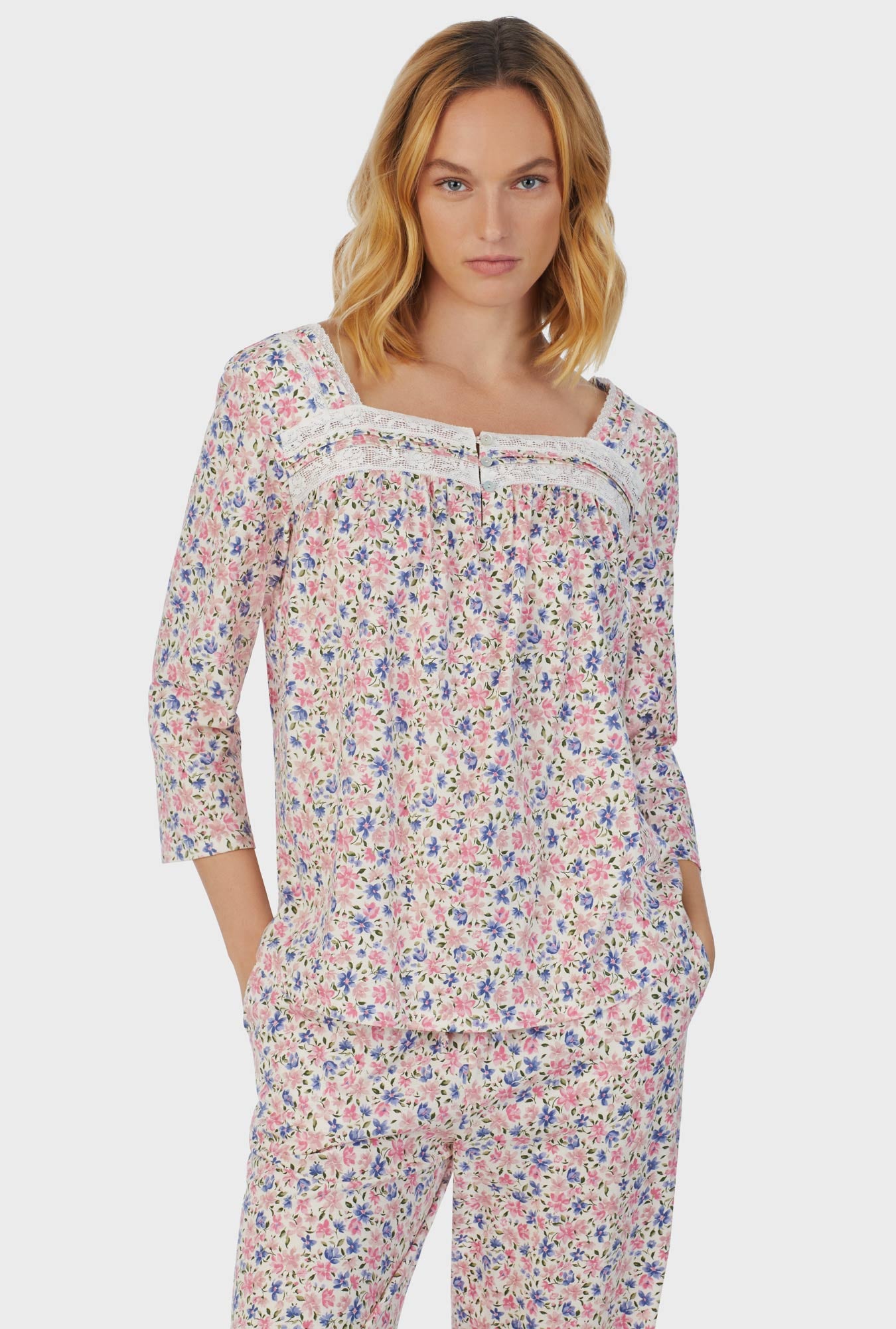 A lady wearing pink short sleeve Long Pajama Set with Floral Fields print