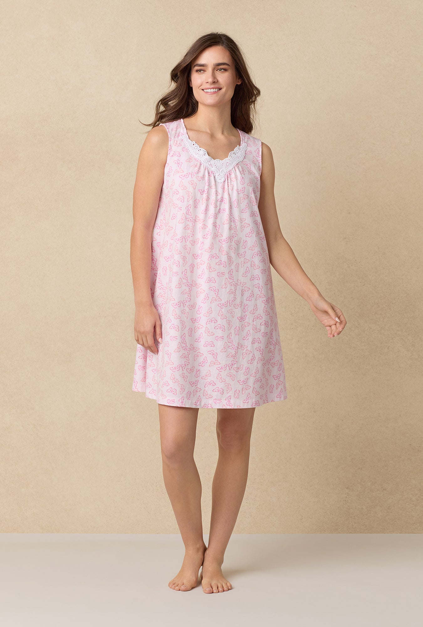 A lady wearing Pink Butterfly Cotton Short Nightgown