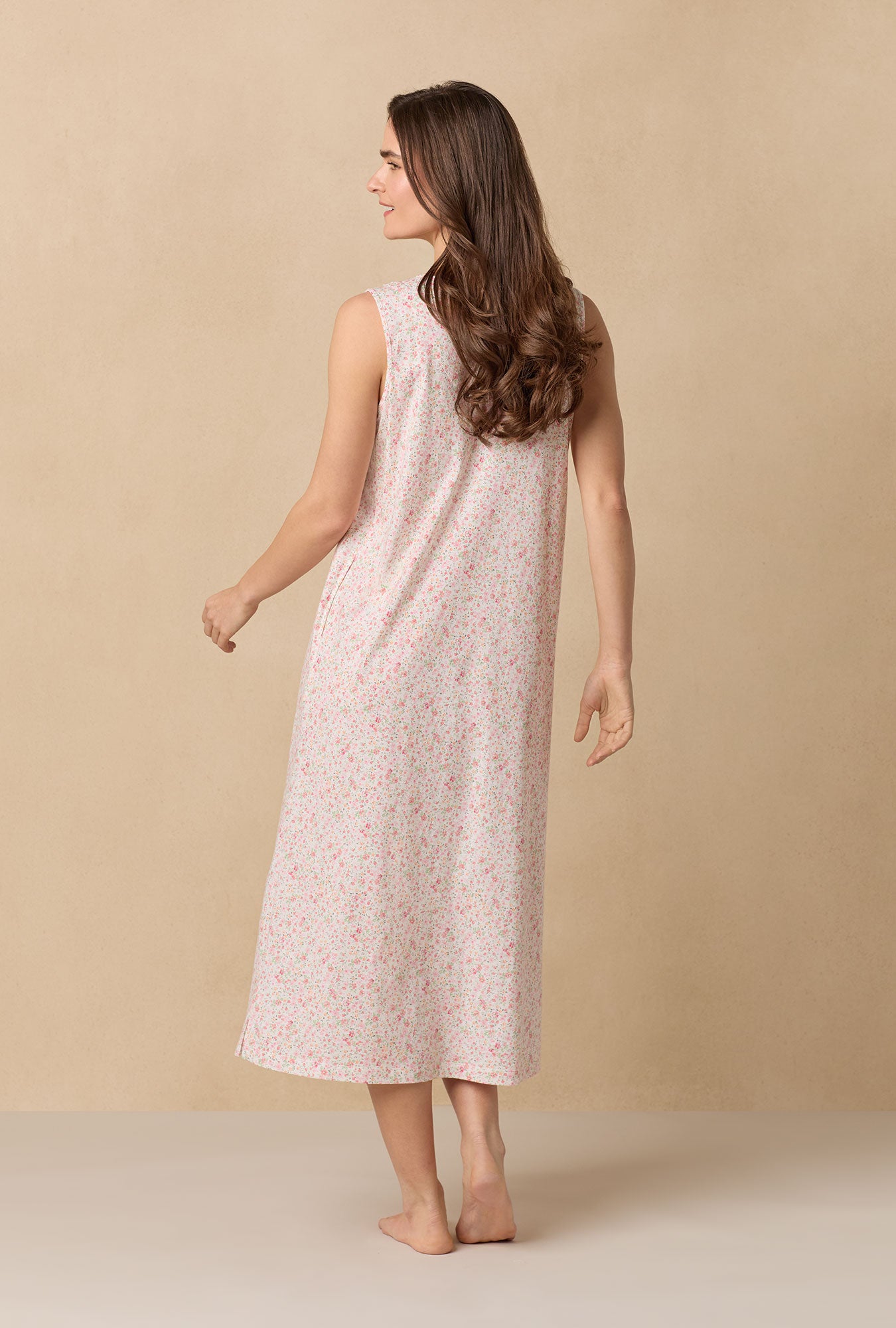 A lady wearing Meadow Floral Long Sleeveless Cotton Knit Nightgown