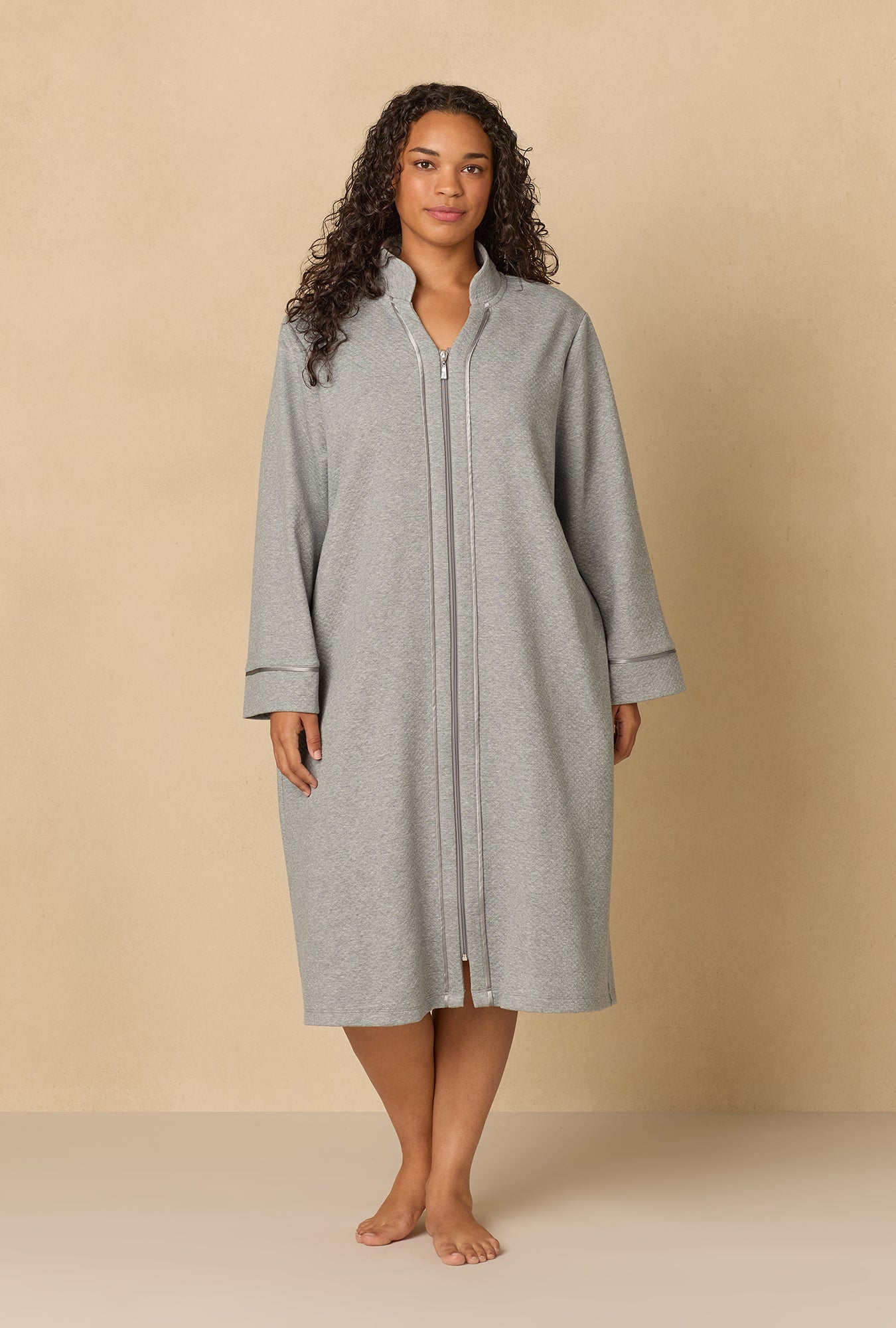 A lady wearing Heather Grey Diamond Quilted Plus Zip Robe