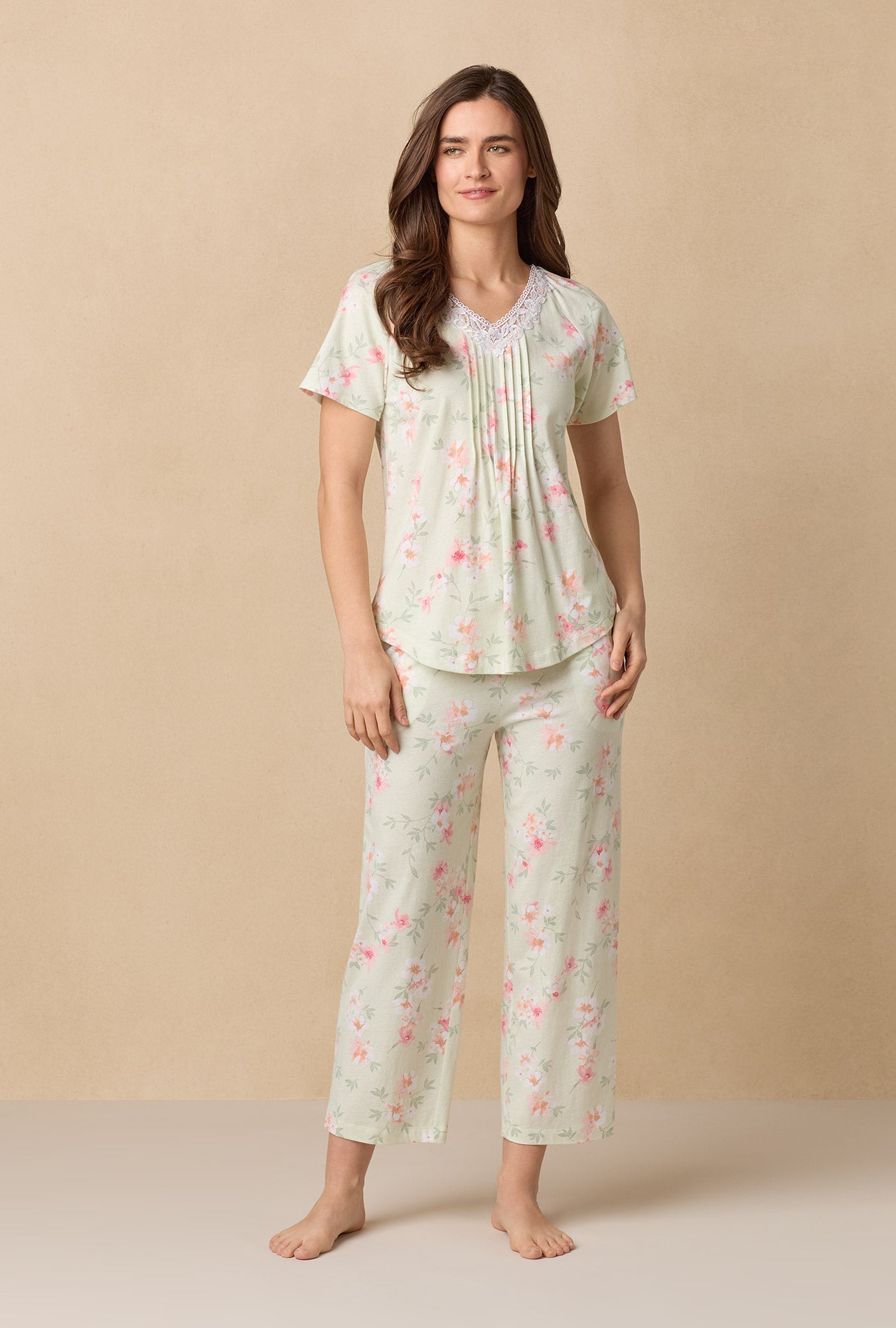 A lady wearing Sage Floral Bloom Capri Cotton Knit Pajama Set
