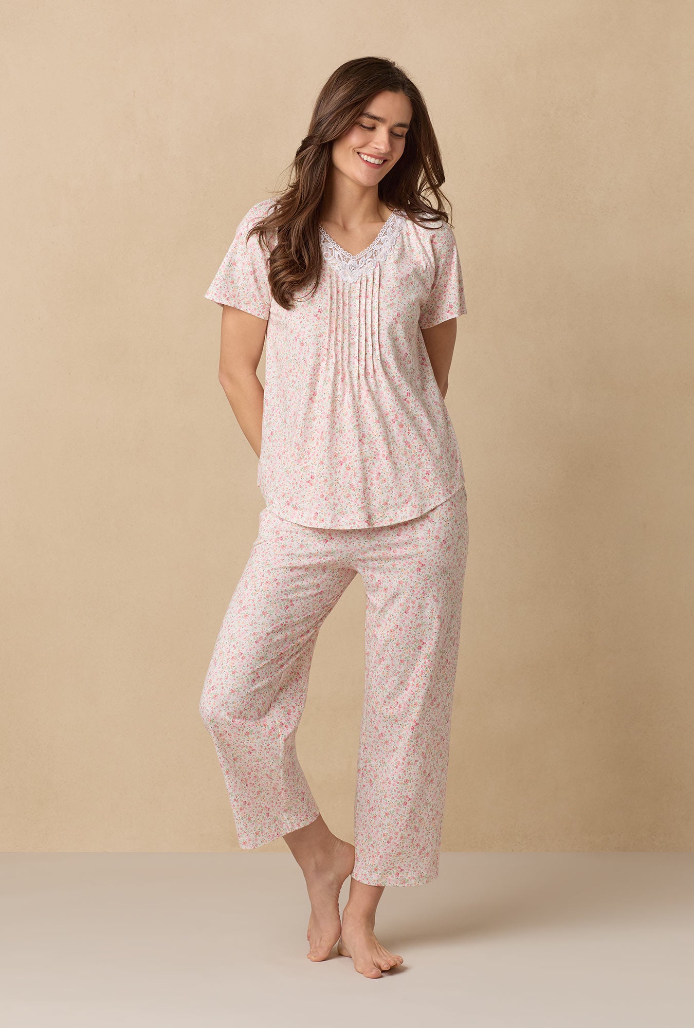A lady wearing Meadow Floral Capri Cotton Knit Pajama Set