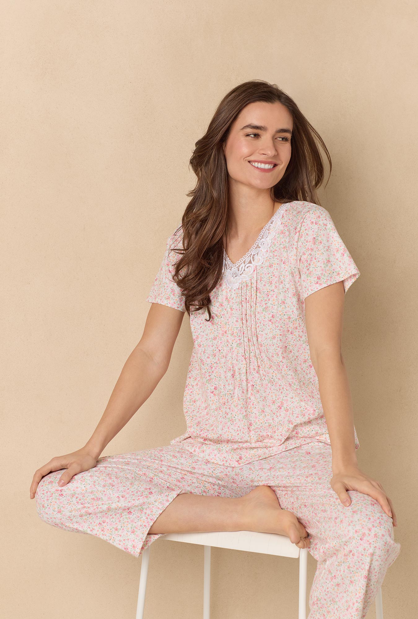 A lady wearing Meadow Floral Capri Cotton Knit Pajama Set