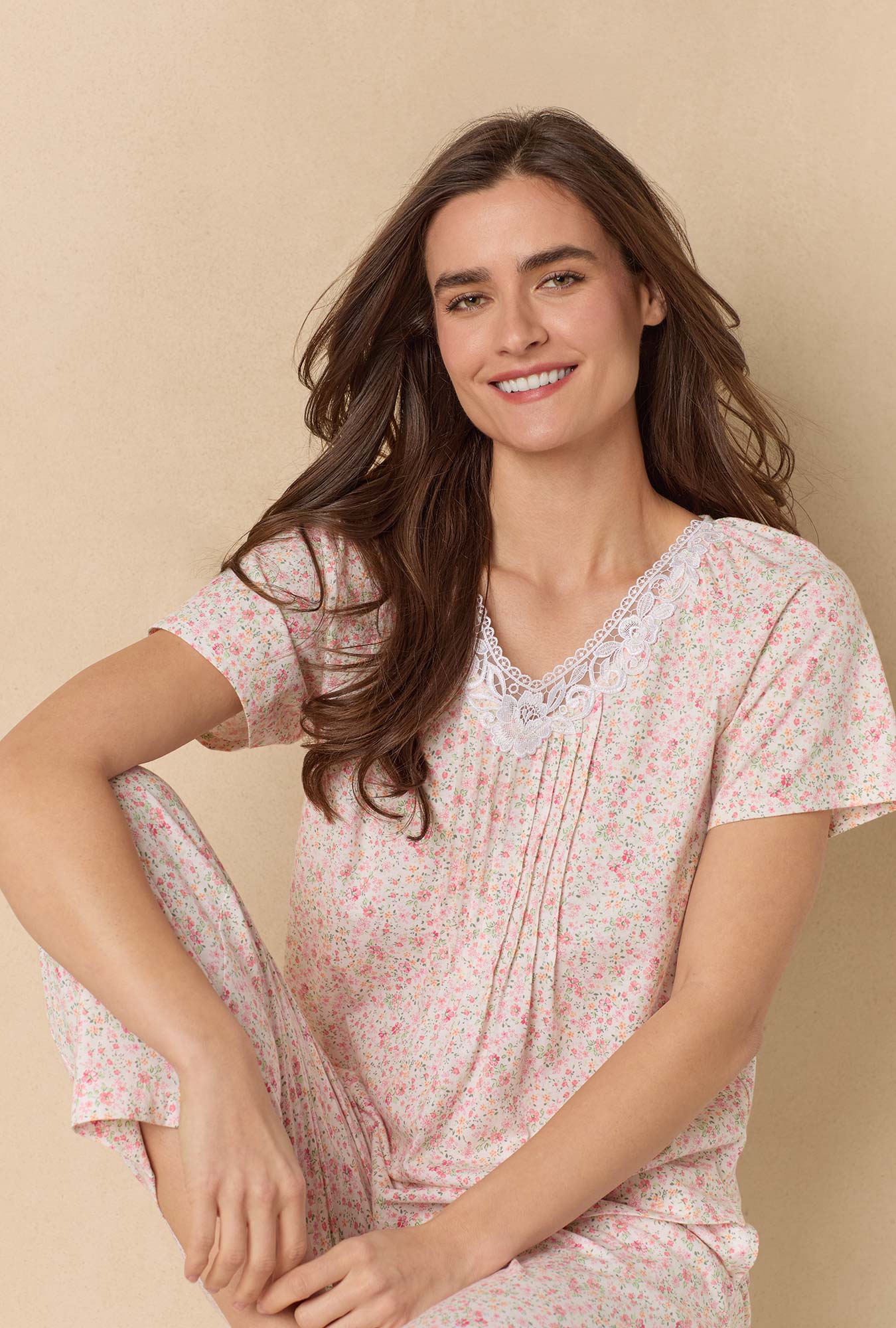 A lady wearing Meadow Floral Capri Cotton Knit Pajama Set