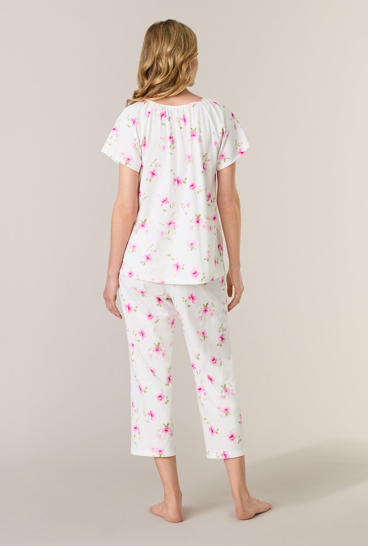 A lady wearing Blush Garden Cotton Capri Pajama Set back view