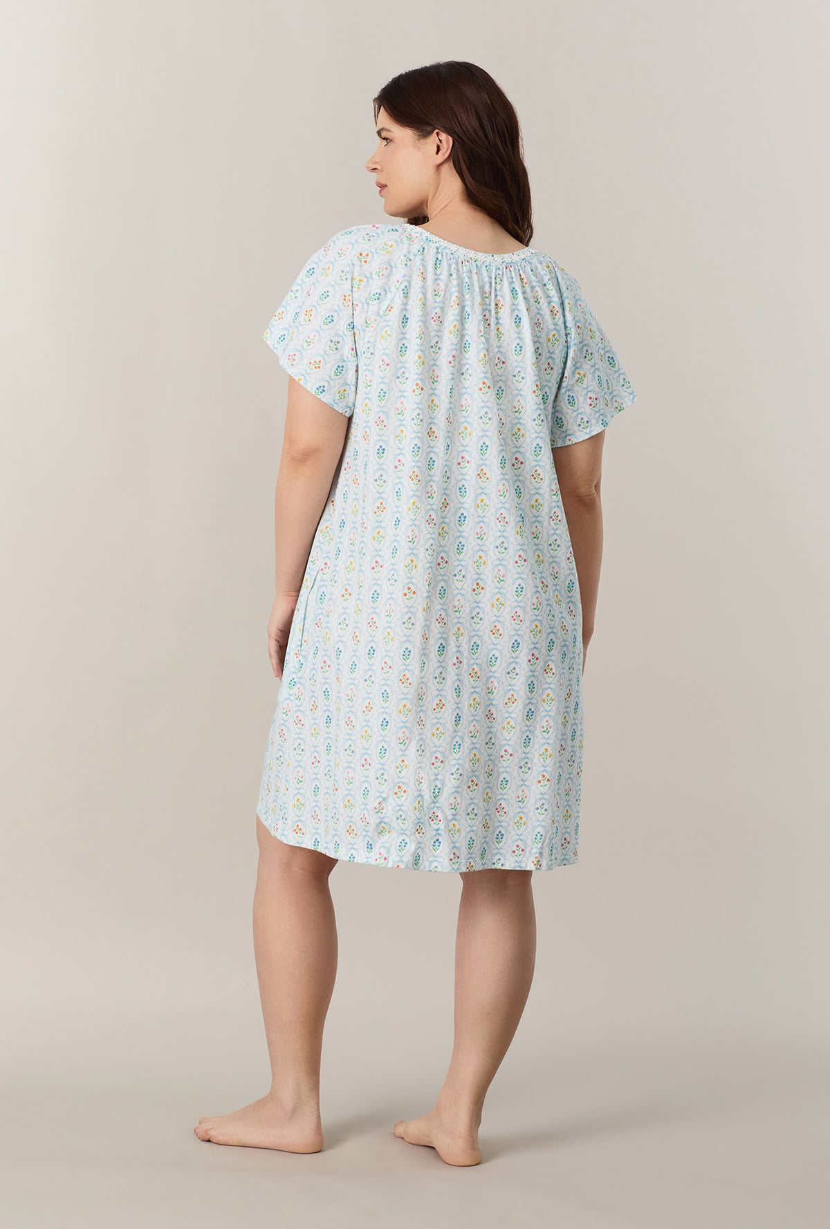 A lady wearing plus size Vintage Garden Short Sleeve Cotton Short Nightgown Back view