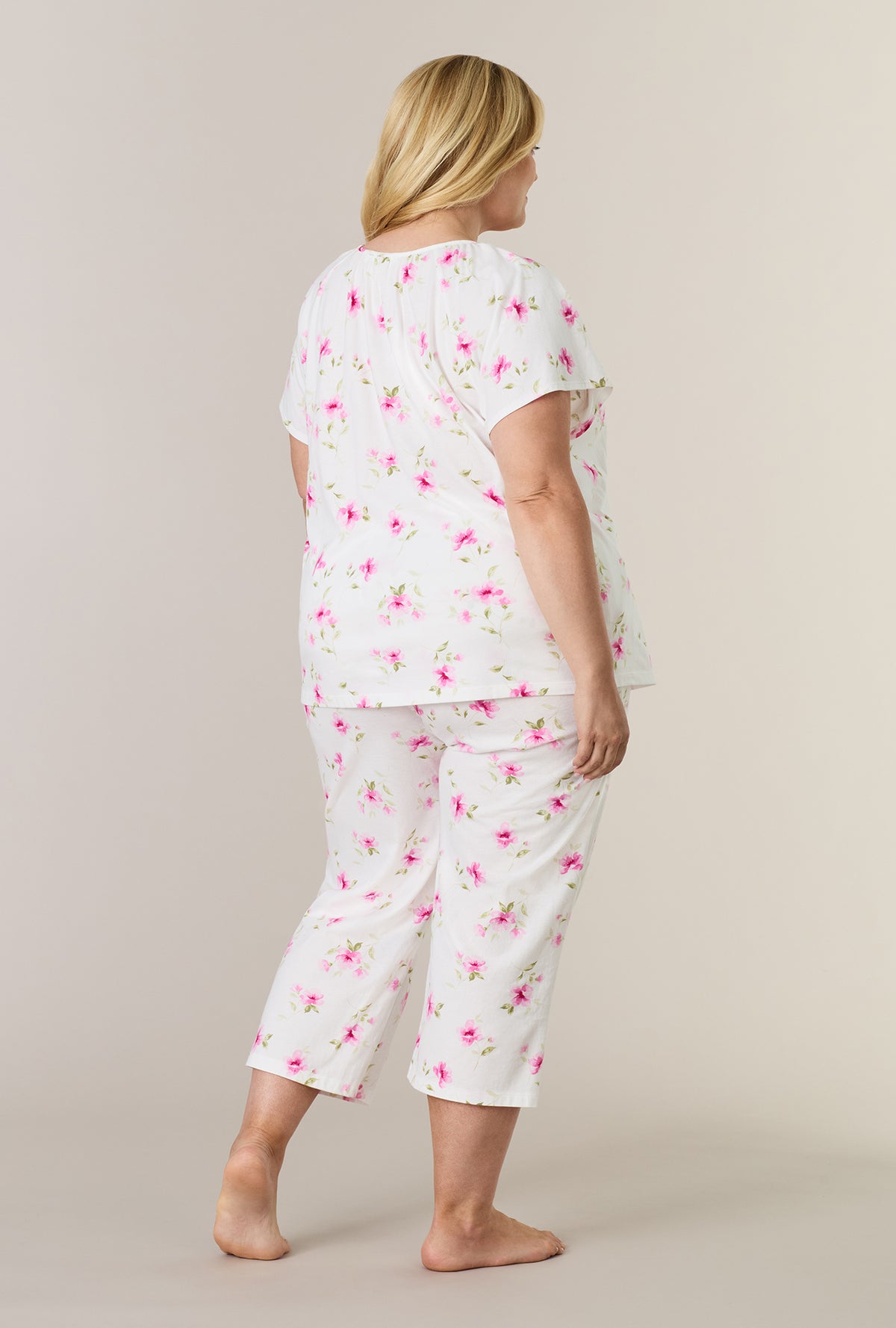 A lady wearing plus size Blush Garden Cotton Capri Pajama Set back view
