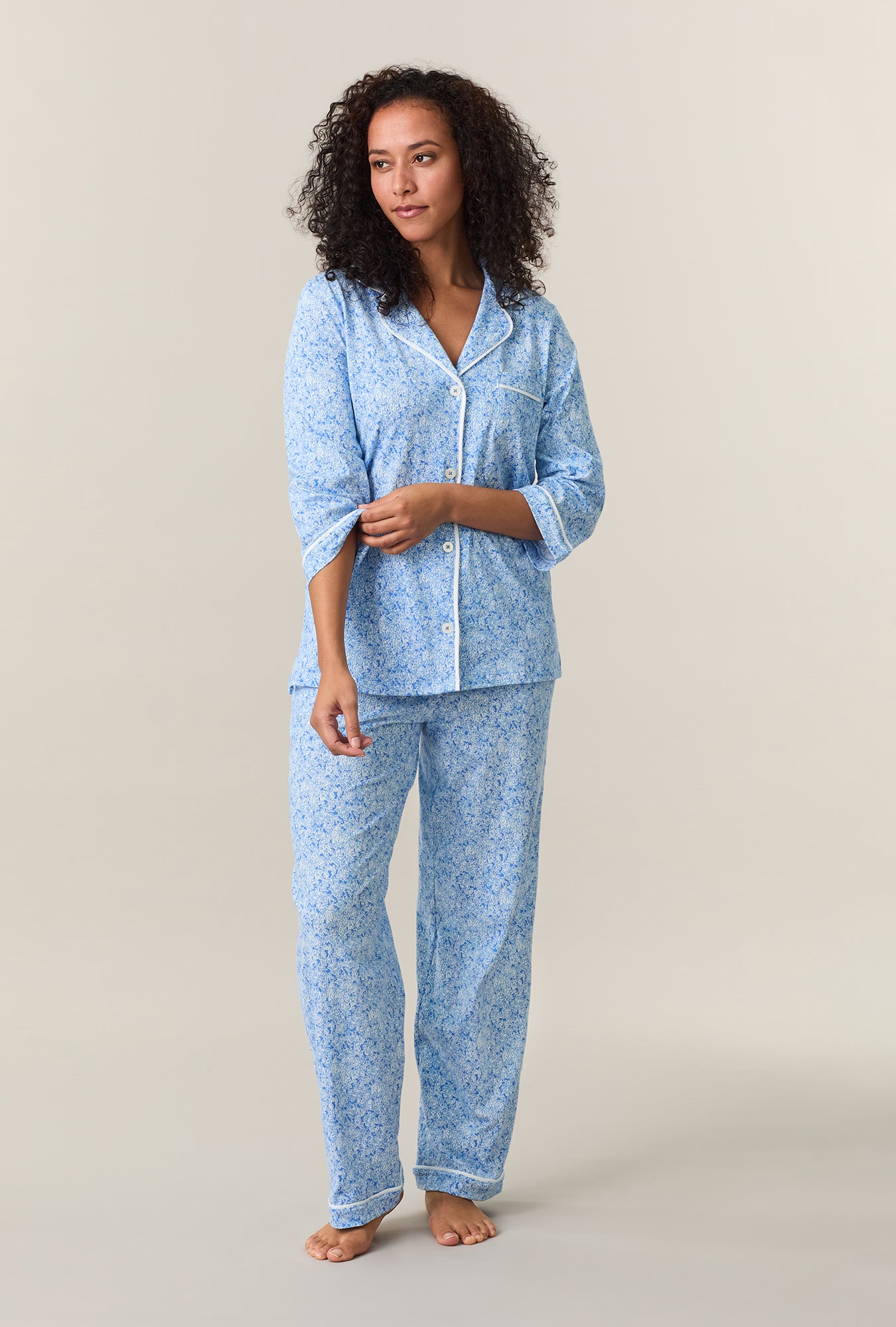 A lady wearing Ultramarine Floral Cotton Long Pajama Set