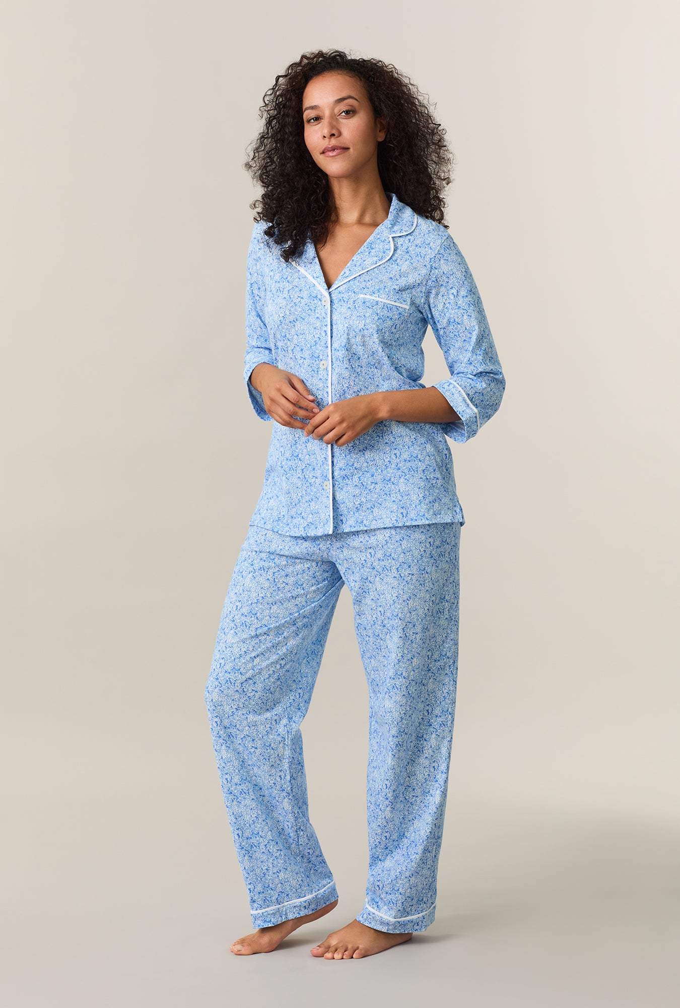 A lady wearing Ultramarine Floral Cotton Long Pajama Set