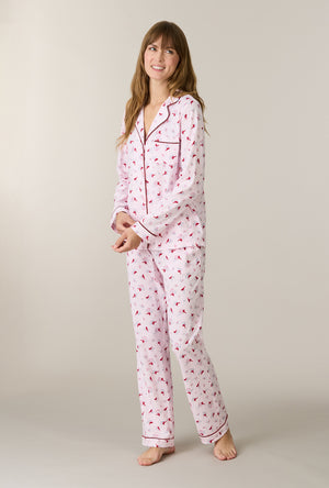 A lady wearing Morning Cardinals Cotton Long Pajama Set looking up