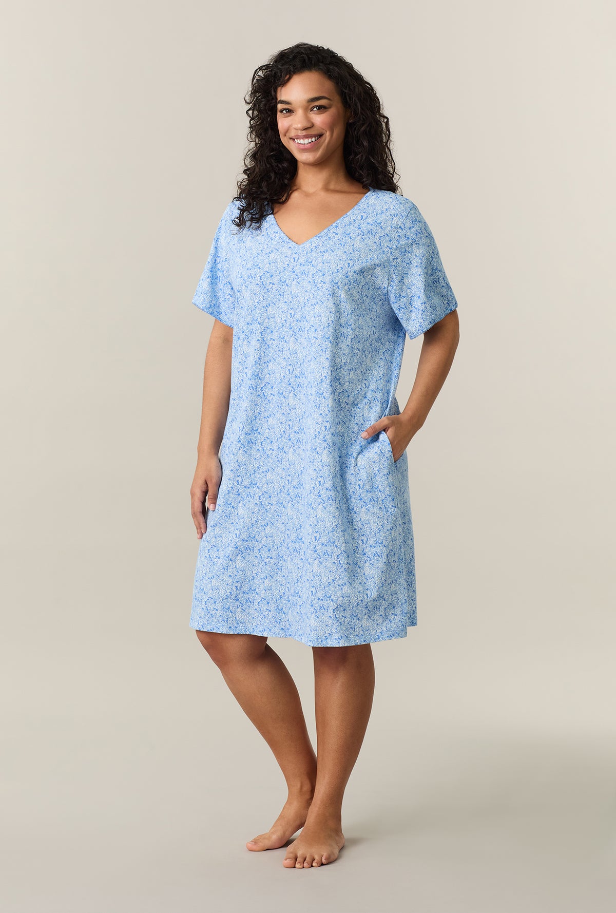 A lady wearing Ultramarine Floral Short Sleeve Cotton Short Sleepshirt