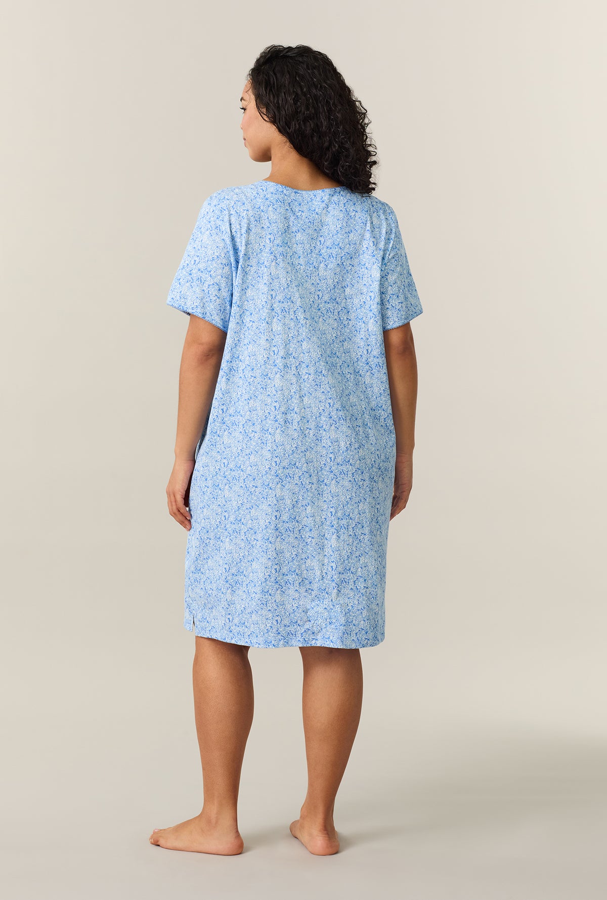 A lady wearing Ultramarine Floral Short Sleeve Cotton Short Sleepshirt