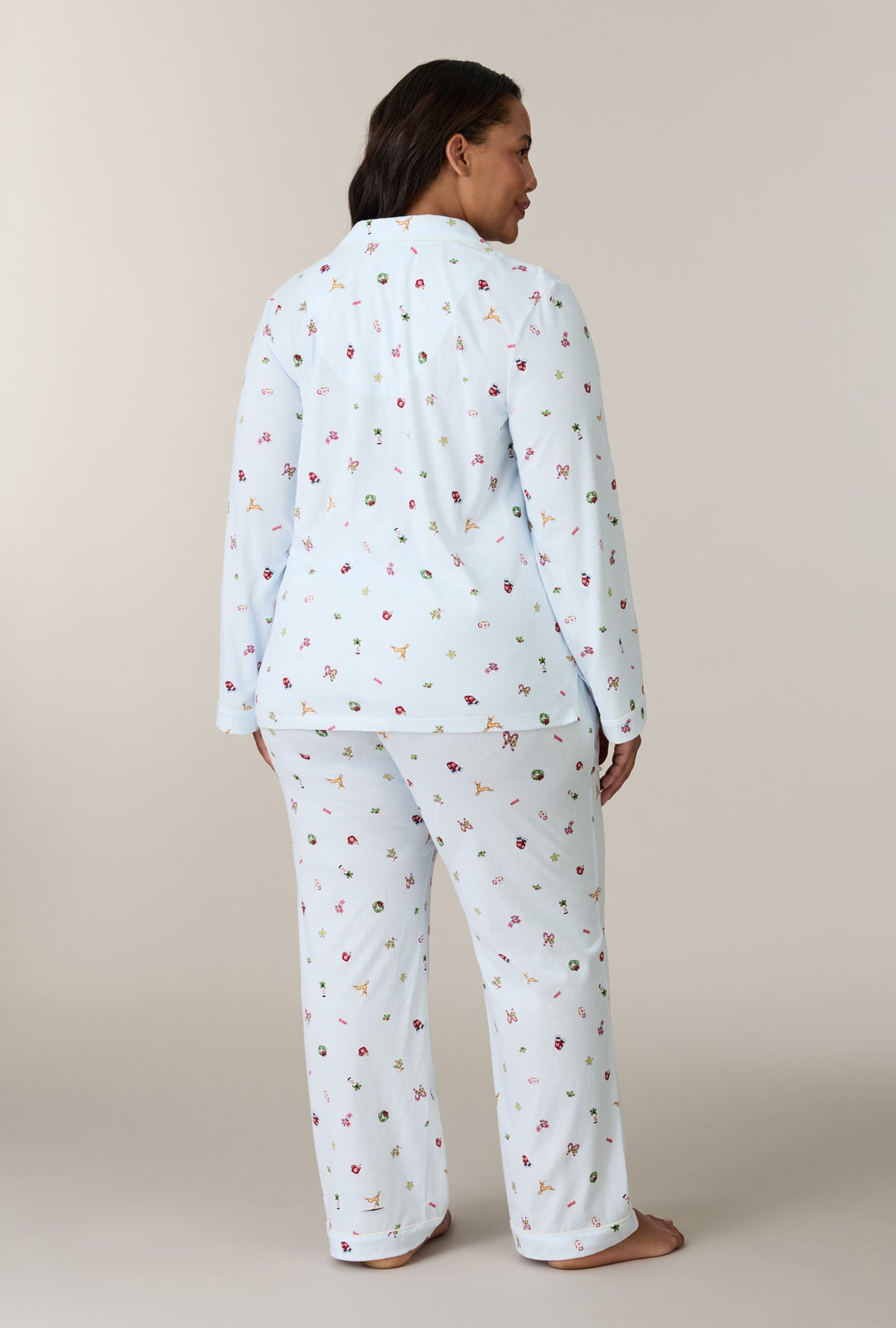 A lady wearing plus size Holiday Keepsakes Cotton Long Pajama Set back view