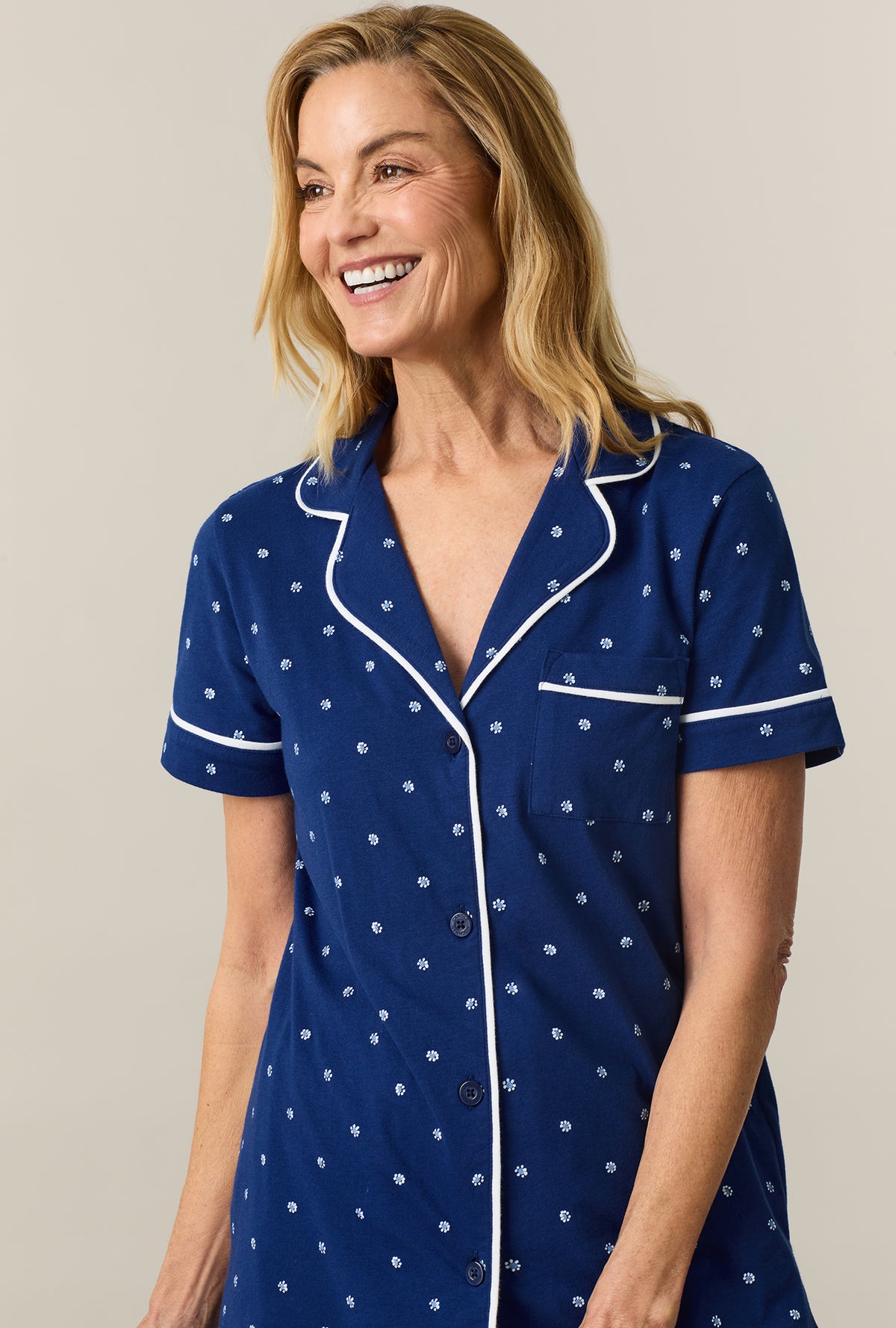 A lady wearing Blue Depths Ditsy Cotton Capri Pajama Set