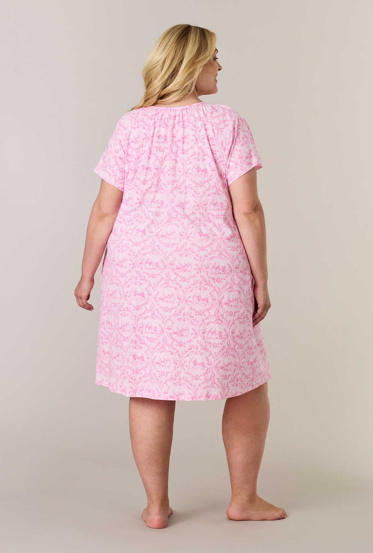 A lady wearing plus size Fairytale Toile Short Sleeve Cotton Short Nightgown back view