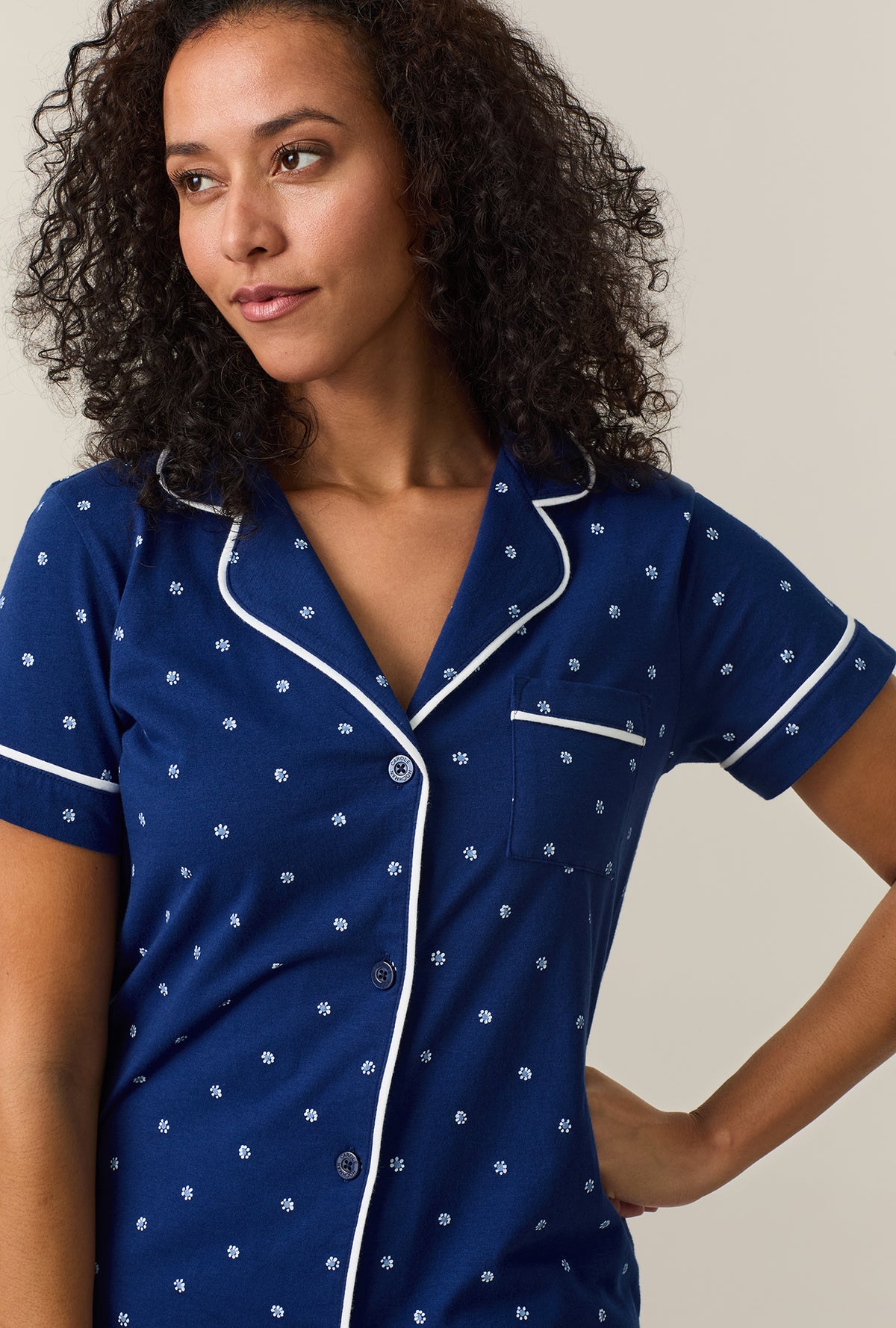 A lady wearing Blue Depths Ditsy Cotton Boxer Pajama Set