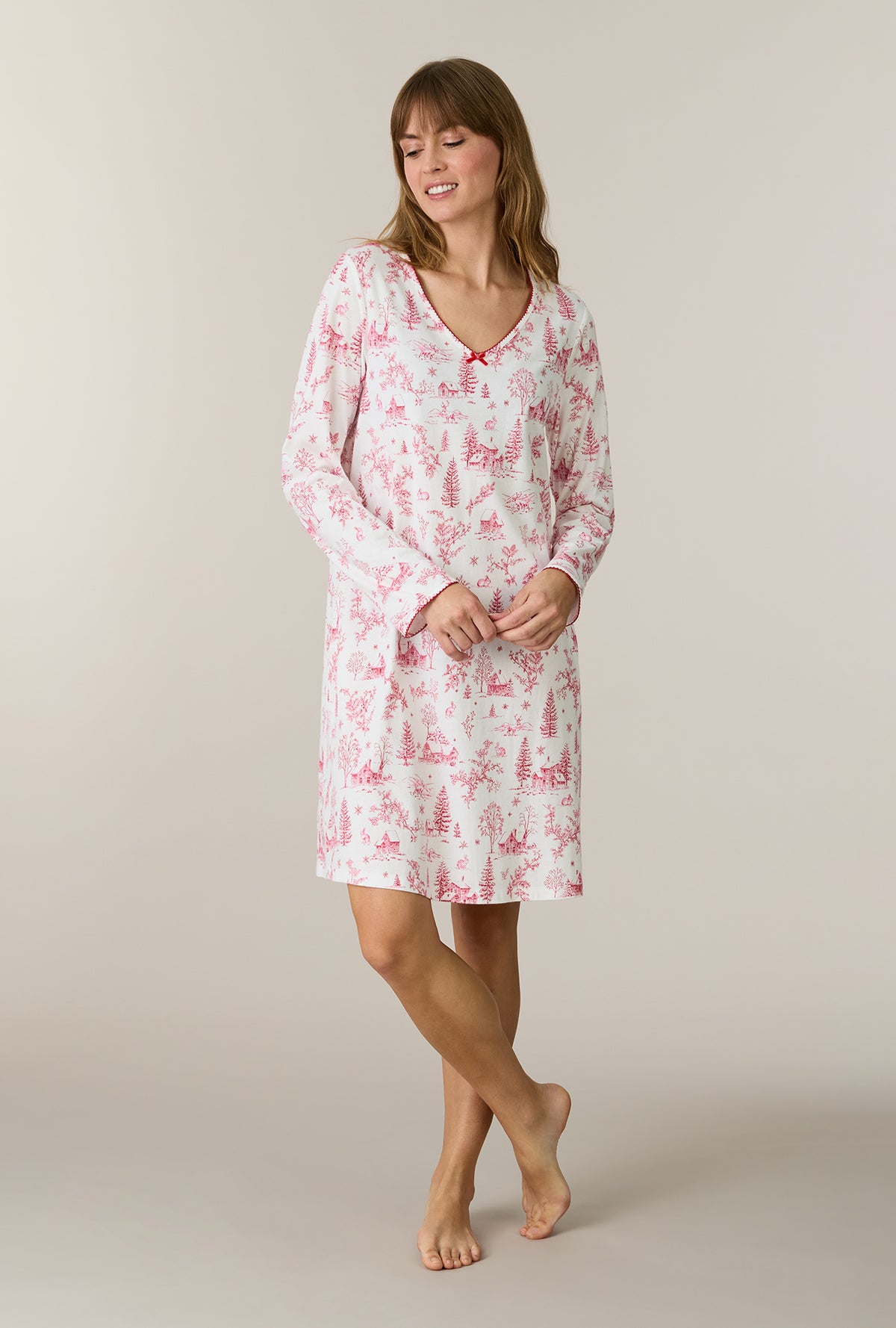 A lady wearing Winter Cottage Toile Cotton Short Nightgown looking down