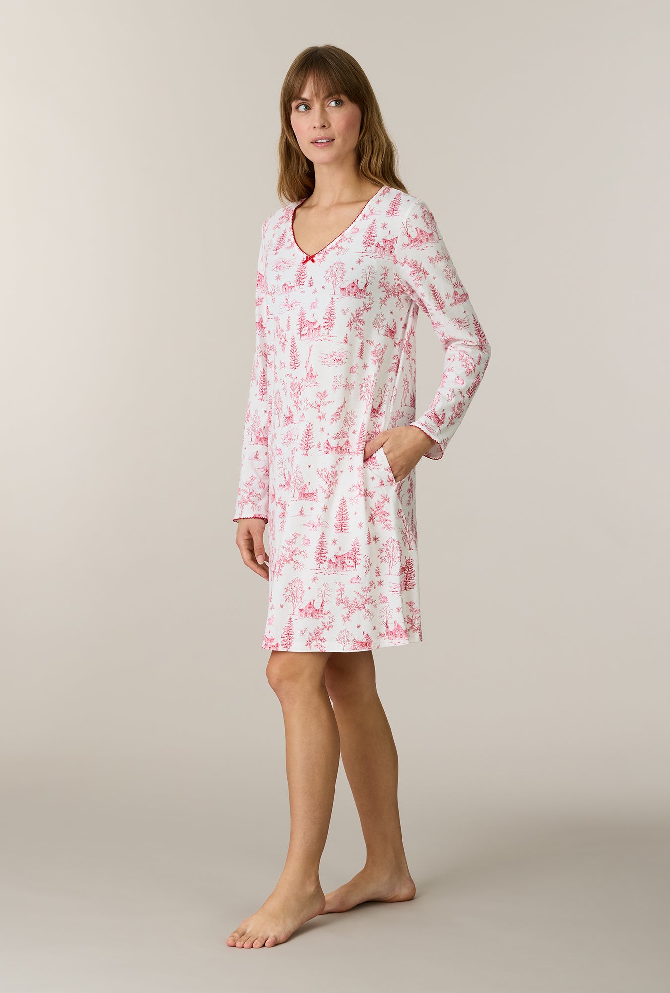 A lady wearing Winter Cottage Toile Cotton Short Nightgown looking down