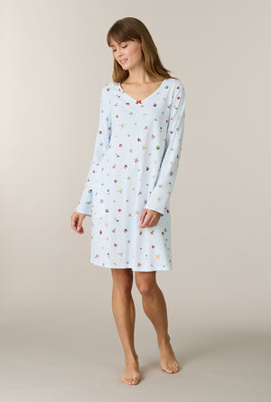 A lady wearing Holiday Keepsakes Cotton Short Nightgown looking down