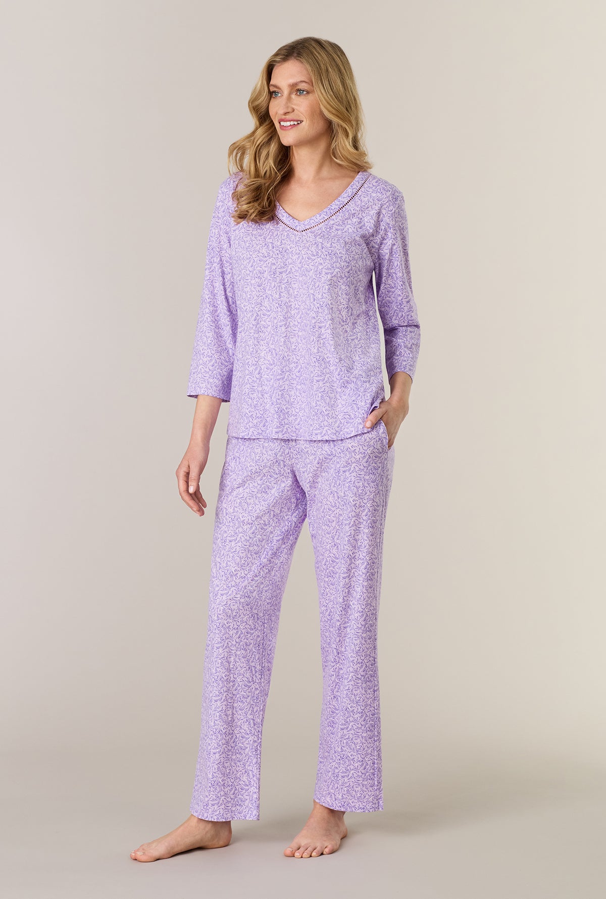 A lady wearing Lavendar Meadow Cotton Long Pajama Set