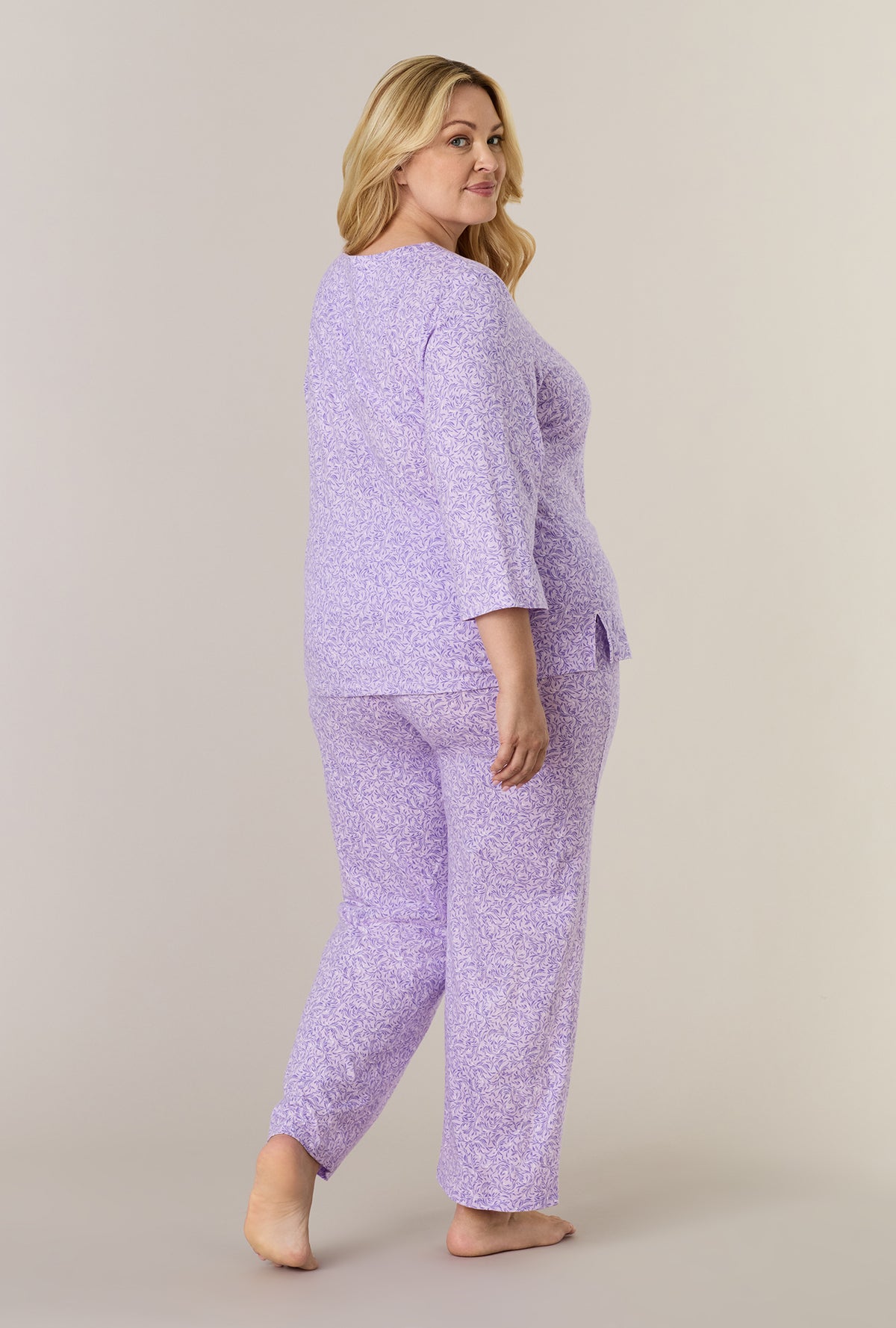 A lady wearing plus size Lavendar Meadow Cotton Long Pajama Set back view