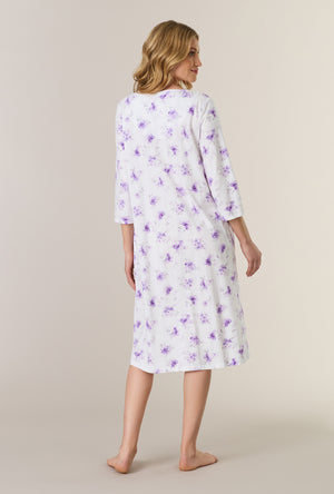 A lady wearing Lilac Blooms Cotton Midi Nightgown back view