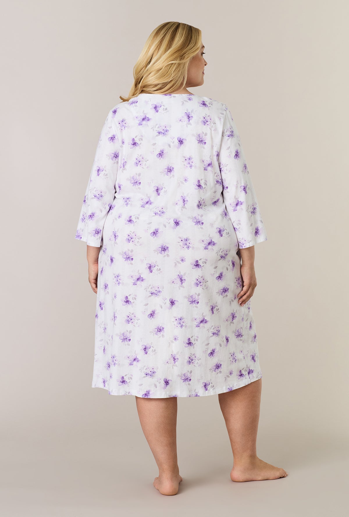 A lady wearing plus size Lilac Blooms Cotton Midi Nightgown back view