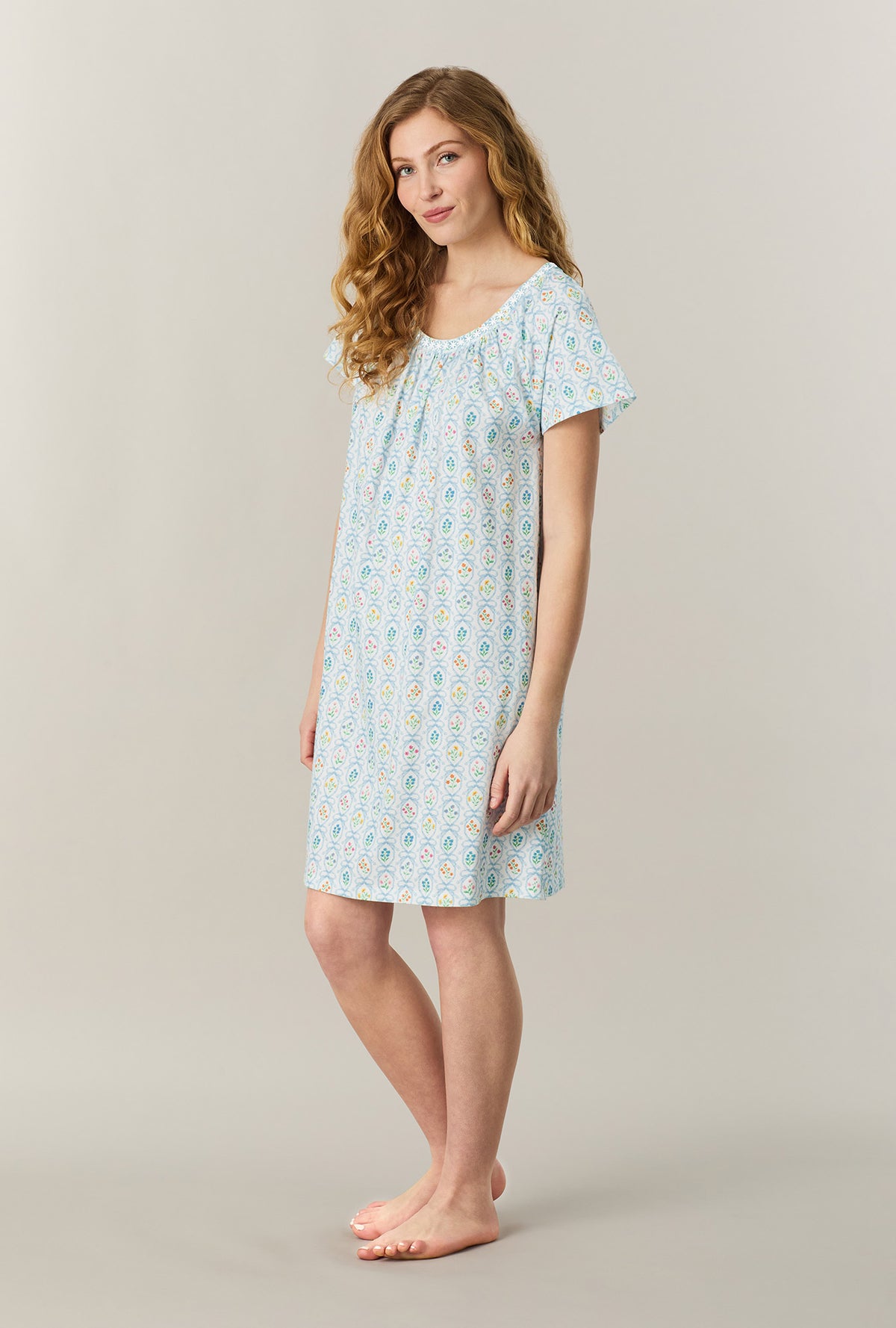A lady wearing Vintage Garden Short Sleeve Cotton Short Nightgown looking right side
