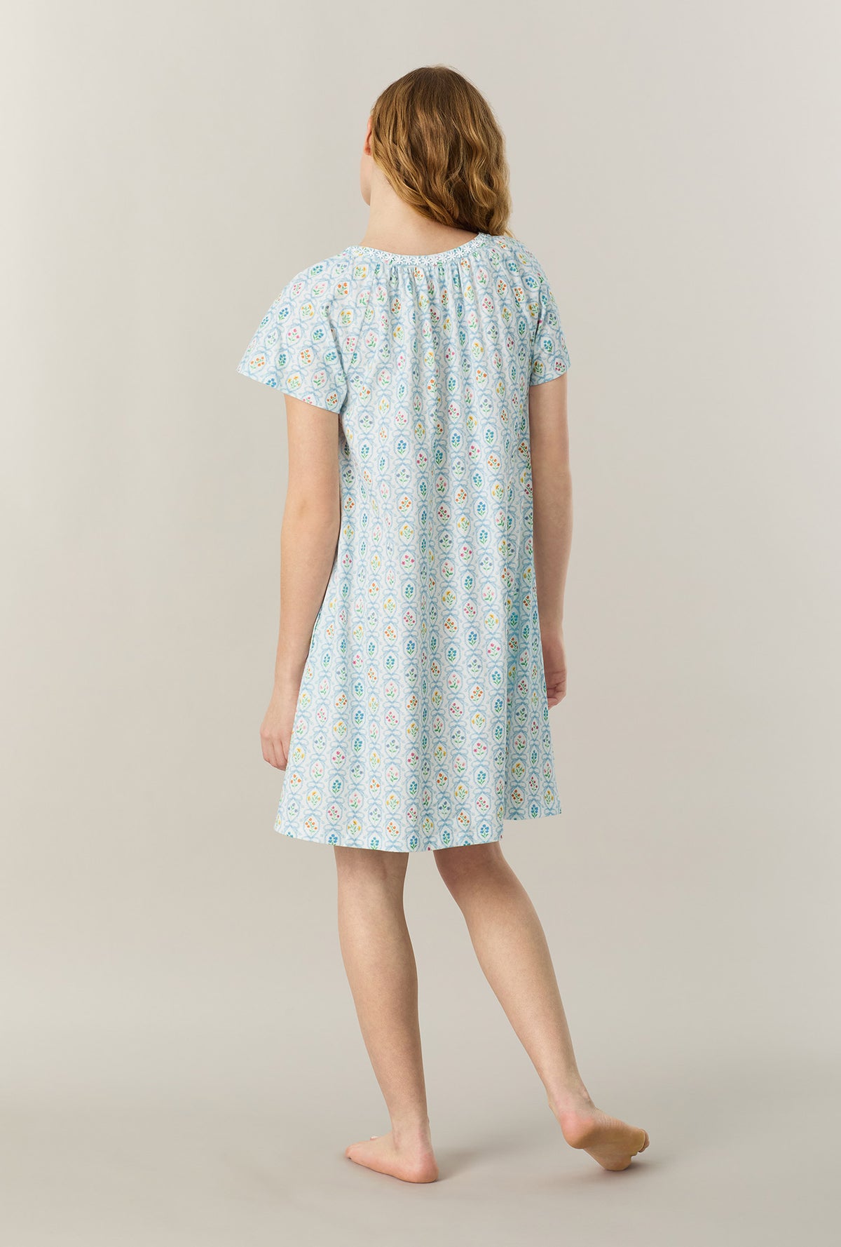 A lady wearing Vintage Garden Short Sleeve Cotton Short Nightgown back view