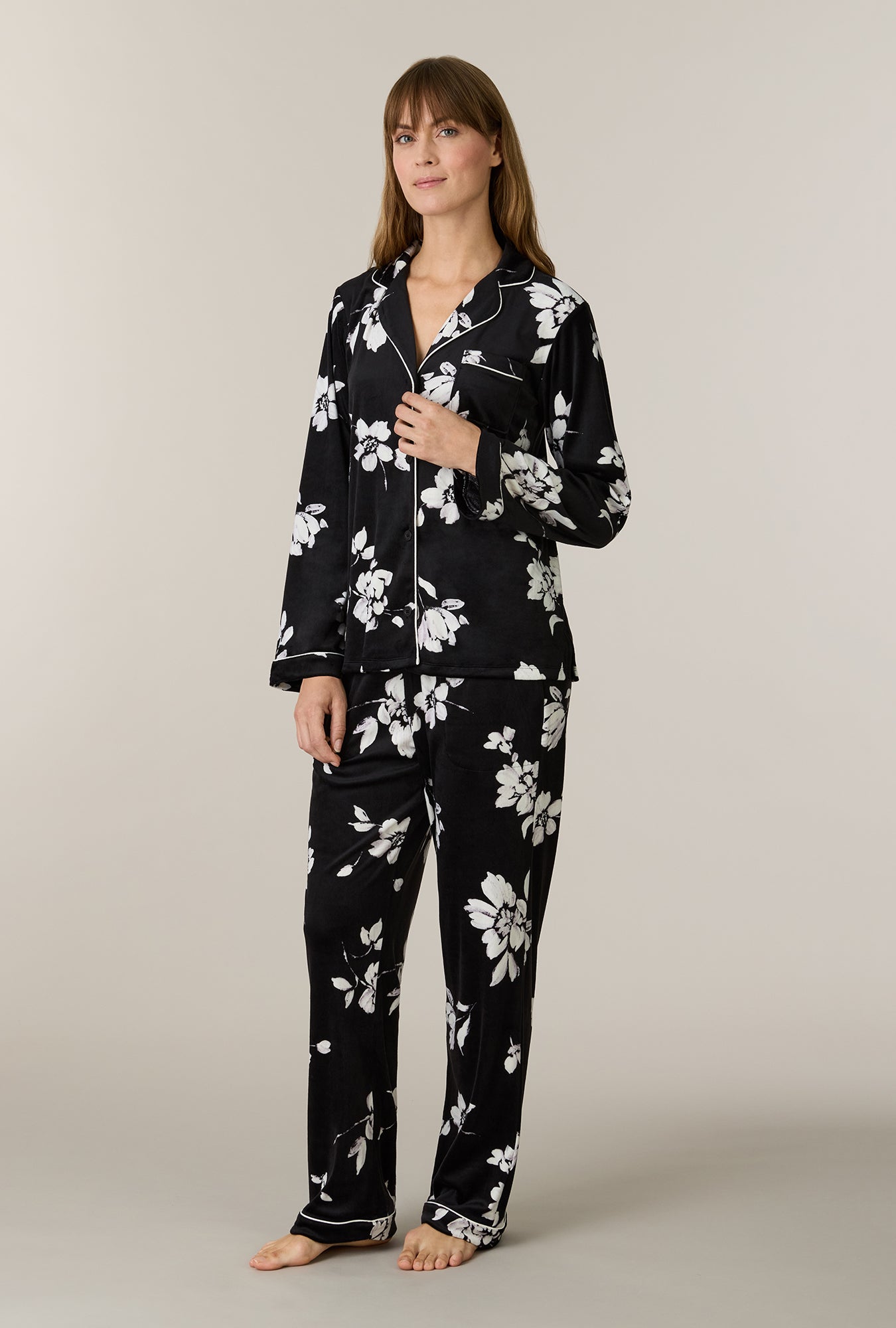 A lady wearing Midnight Blossom Stretch Velour Notch Collar Long Pajama Set