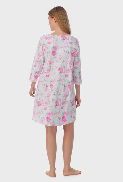 A lady wearing quarter sleeve Cotton Short Nightgown with Dream Garden print   