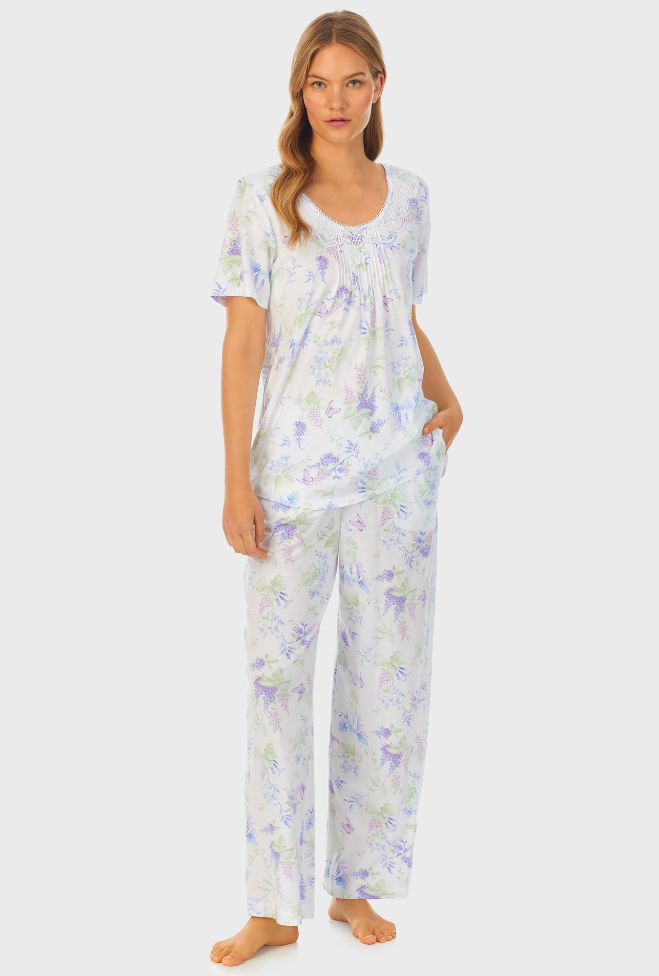 A lady wearing Cotton Long Pajama Set with Butterfly Garden print