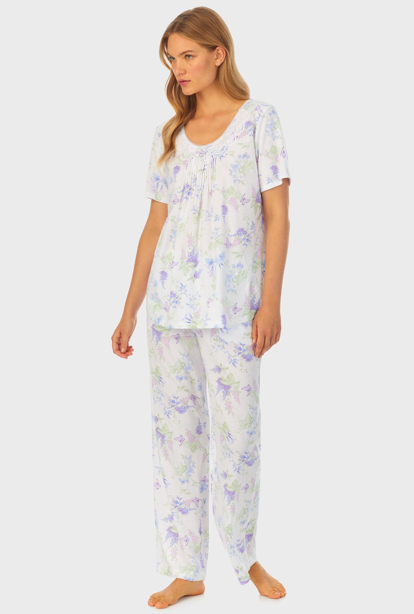 A lady wearing Cotton Long Pajama Set with Butterfly Garden print