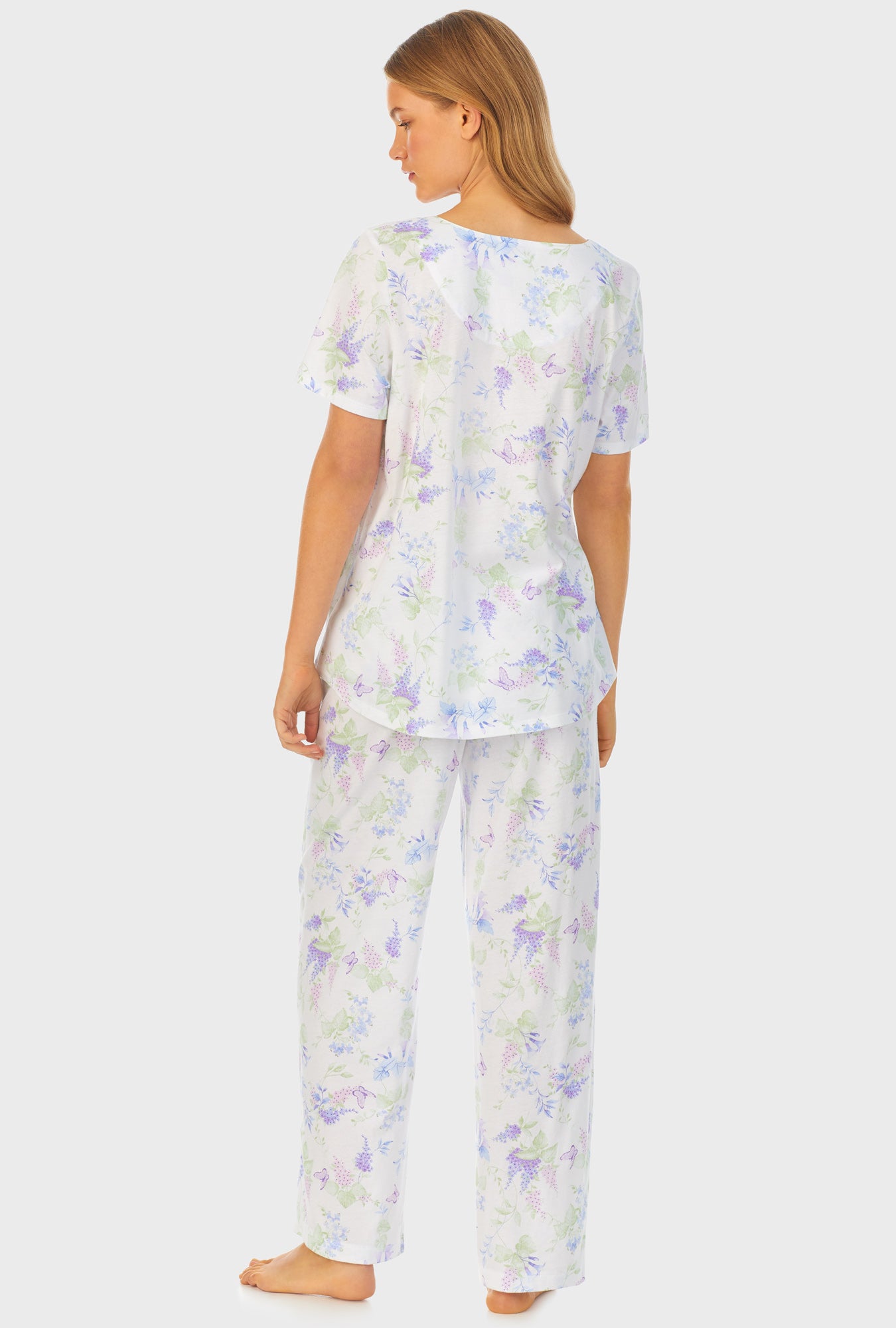 A lady wearing Cotton Long Pajama Set with Butterfly Garden print