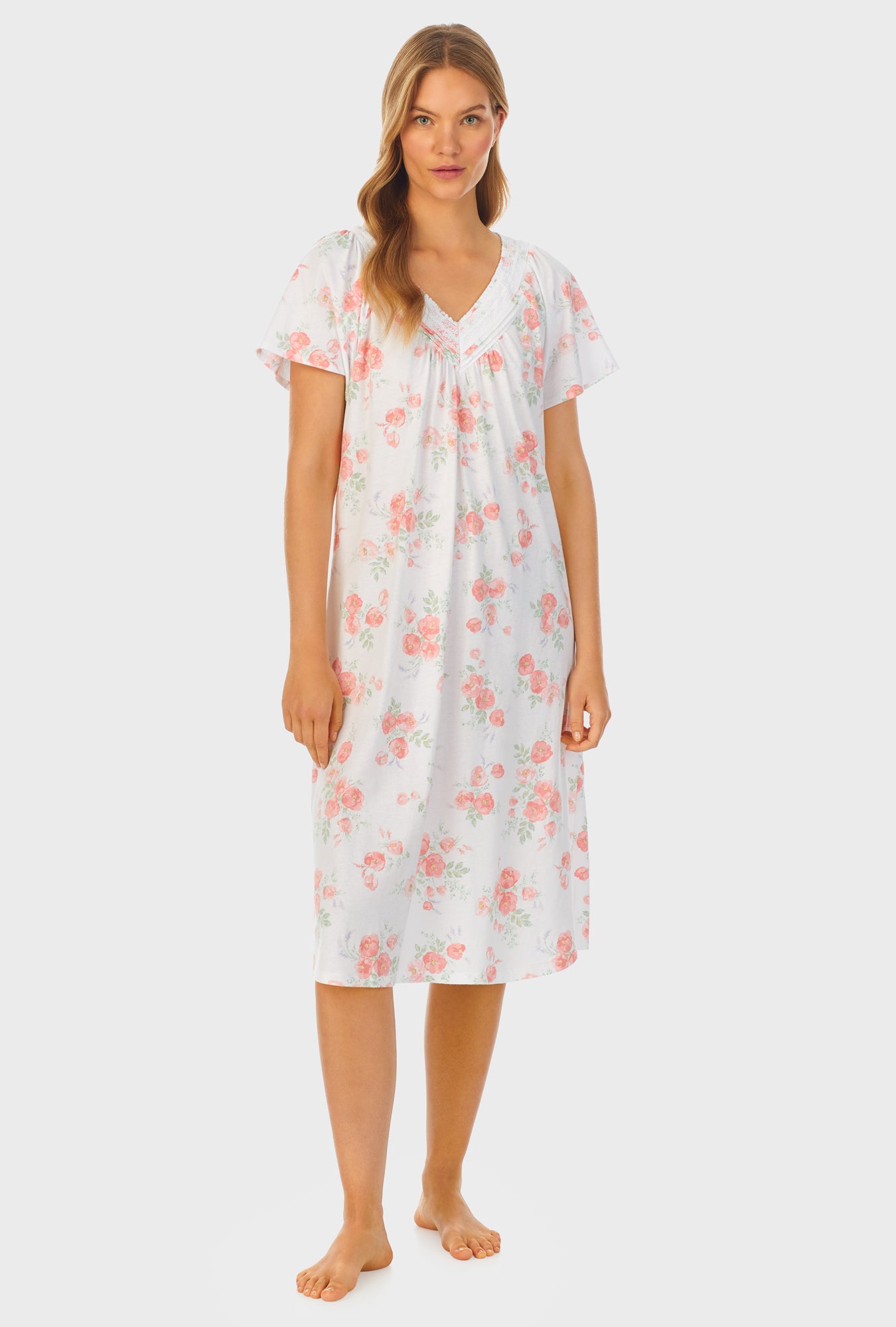A lady wearing white short sleeve Cotton Waltz Nightgown with Watercolor Fleur print
