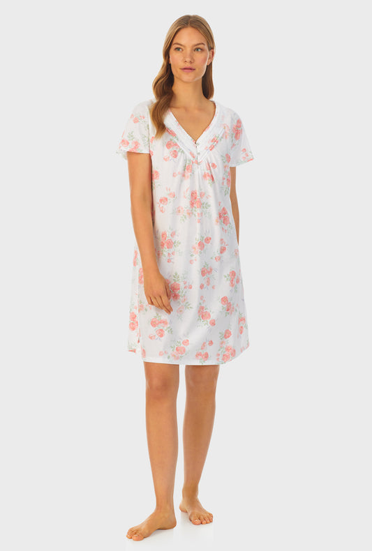 A lady wearing white short sleeve Cotton Short Nightgown with Watercolor Fleur print