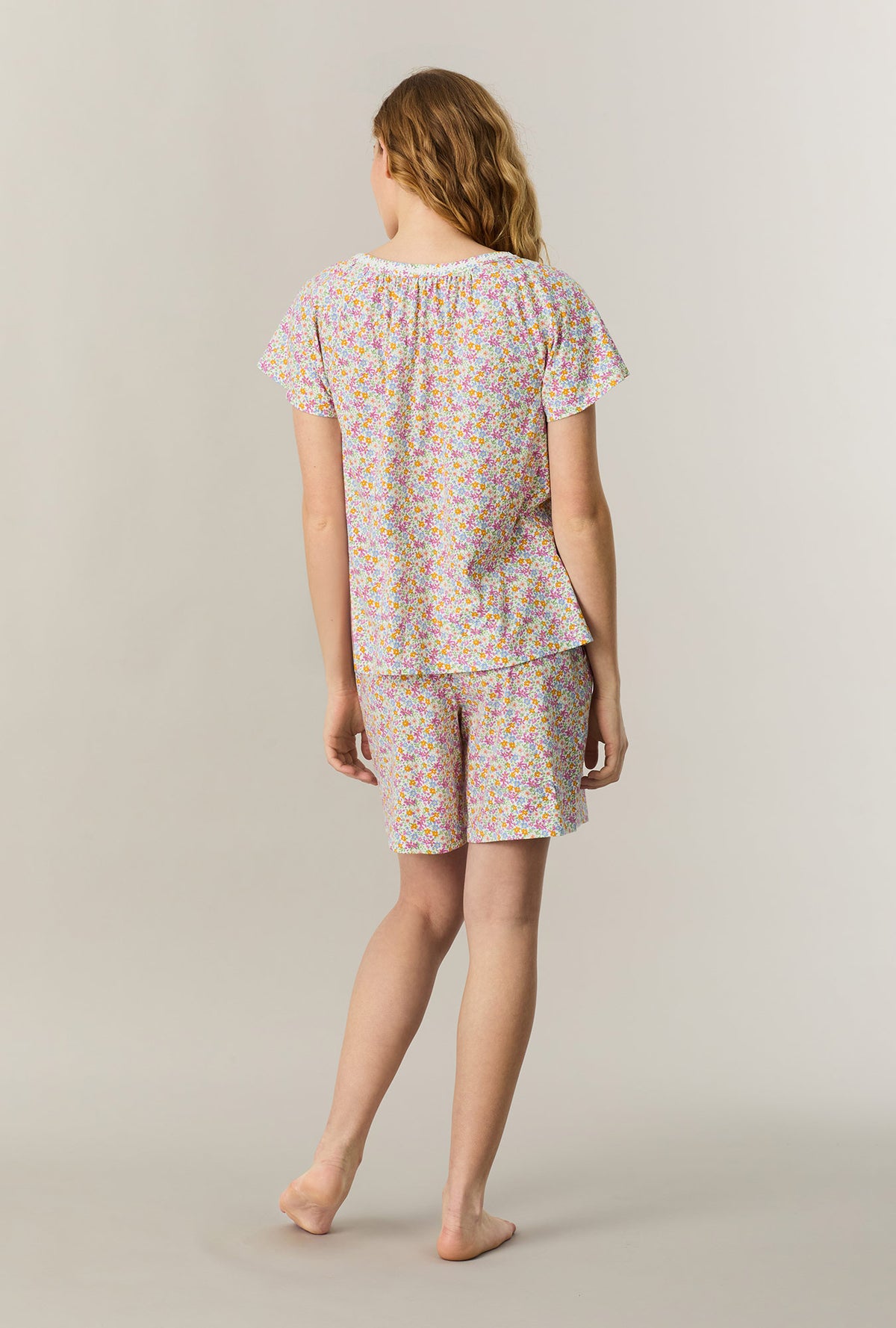 A lady wearing Summer Meadow Cotton Bermuda Pajama Set back view