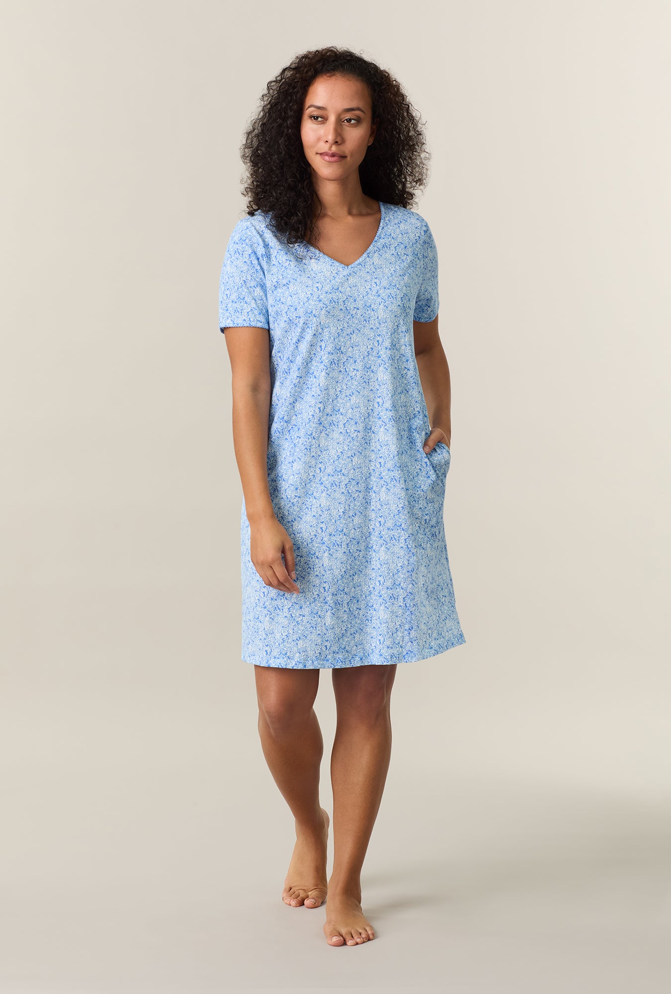 A lady wearing Ultramarine Floral Short Sleeve Cotton Short Sleepshirt