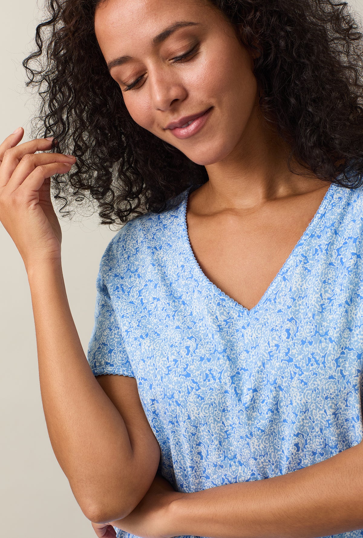 A lady wearing Ultramarine Floral Short Sleeve Cotton Short Sleepshirt