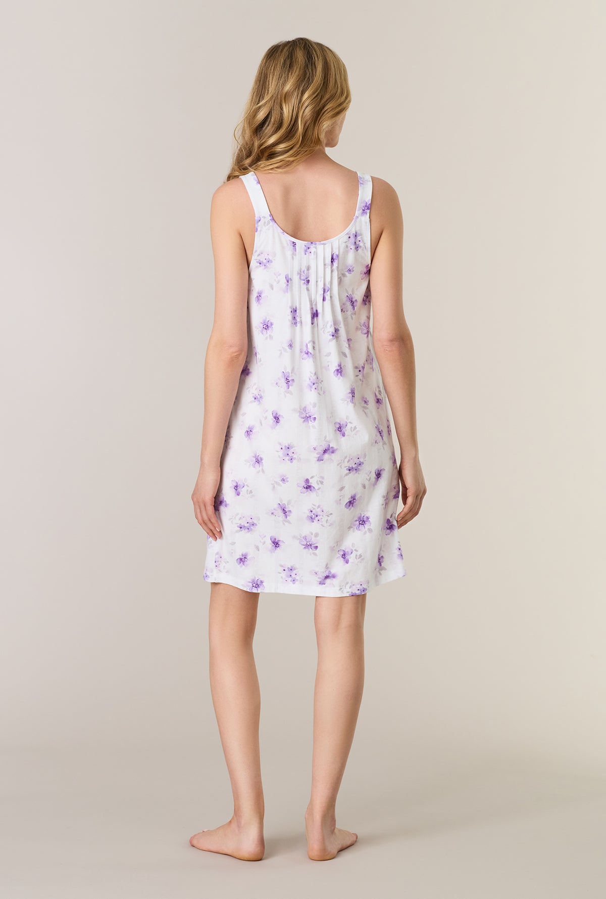 A lady wearing Lilac Blooms Cotton Short Chemise back view